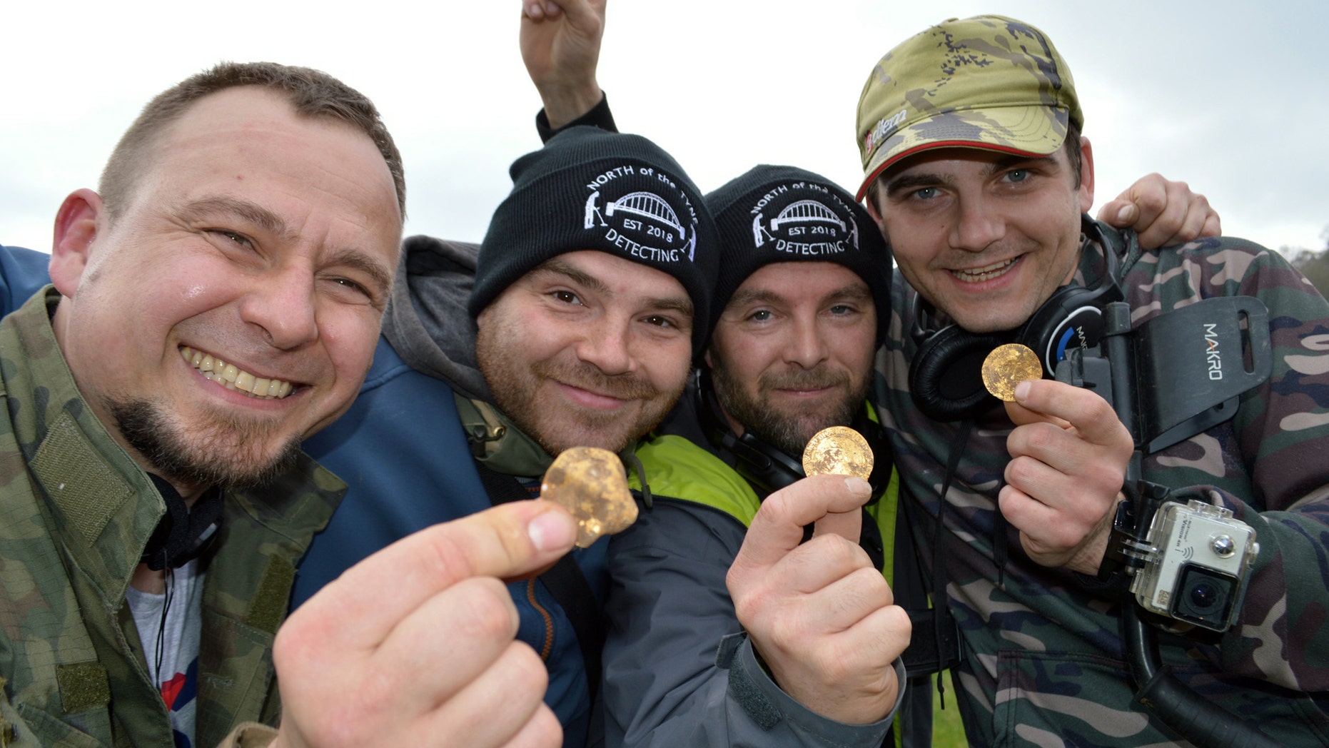 Dariusz Fijalkowski , Mateusz Nowak, Andrew Winter, Tobiasz Nowak. Four amateur metal detectorists have uncovered a hoard of 14th-century coins in a field in Hambleden, Buckinghamshire- worth an estimated £150,000. (Credit: SWNS)