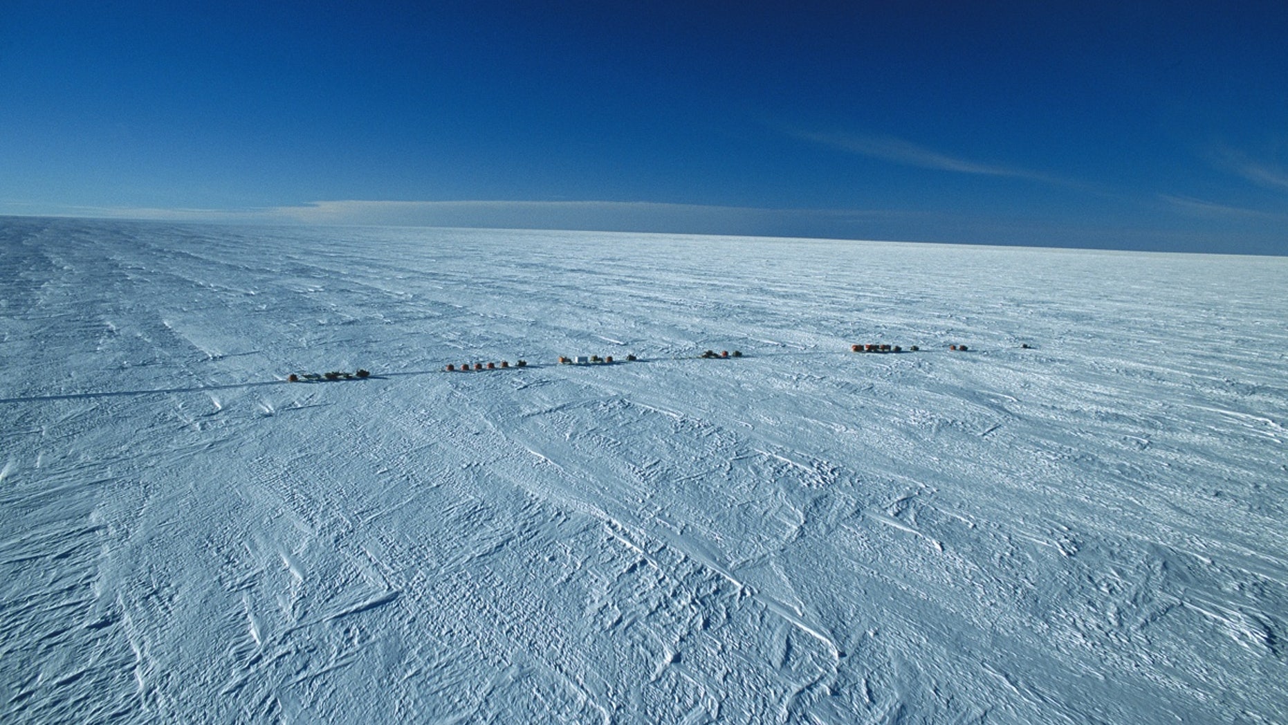 Researchers on their way to Dome C near the Concordia station on the Antarctic Plateau in Antarctica.