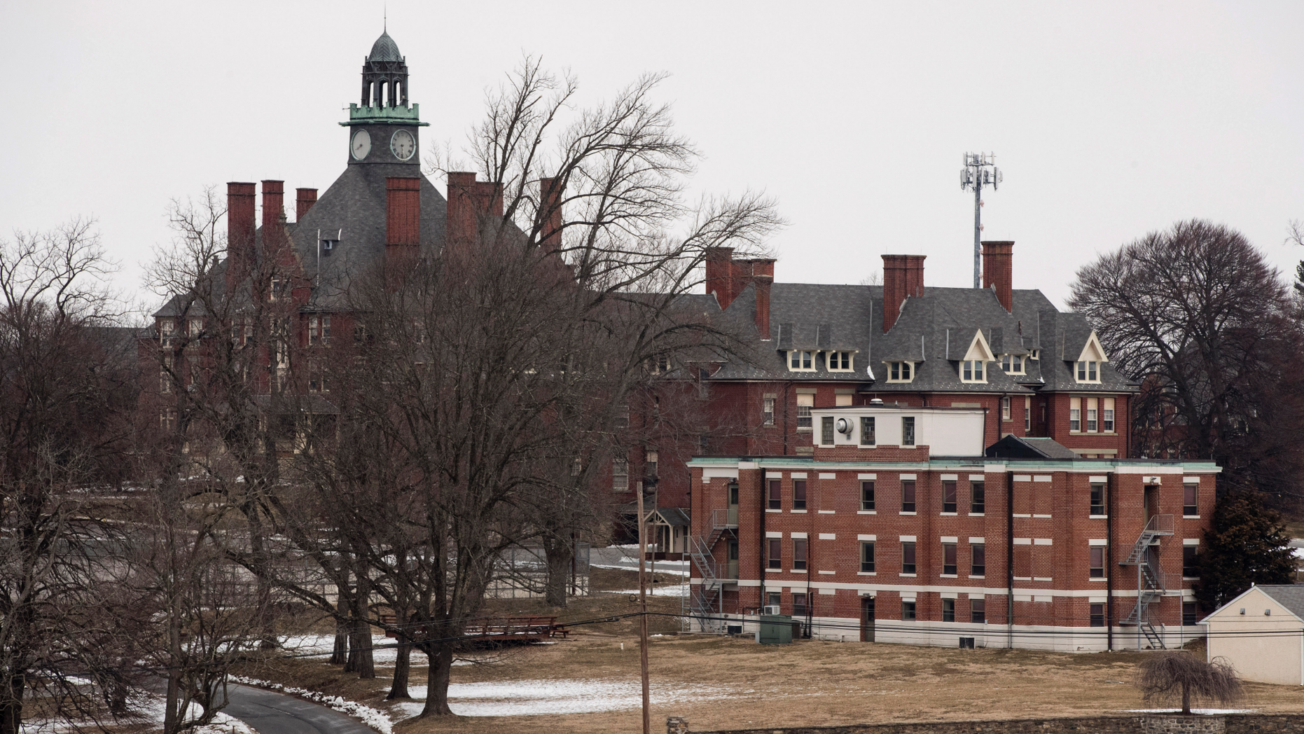 FILE - This March 7, 2019, file photo, shows the Glen Mills Schools in Glen Mills, Pa. A spokeswoman for the nation's oldest reform school says they'll appeal the state's decision to revoke licenses at the suburban Philadelphia campus amid an investigation into child abuse allegations. (AP Photo/Matt Rourke, File)