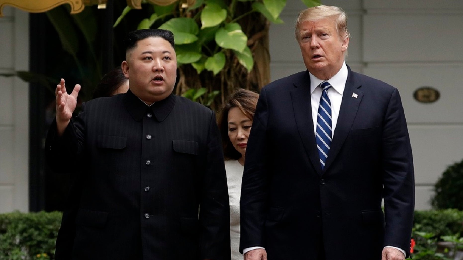 President Trump and North Korean leader Kim Jong Un take a walk after their first meeting at the Sofitel Legend Metropole Hanoi hotel, in Hanoi in February. (Associated Press)