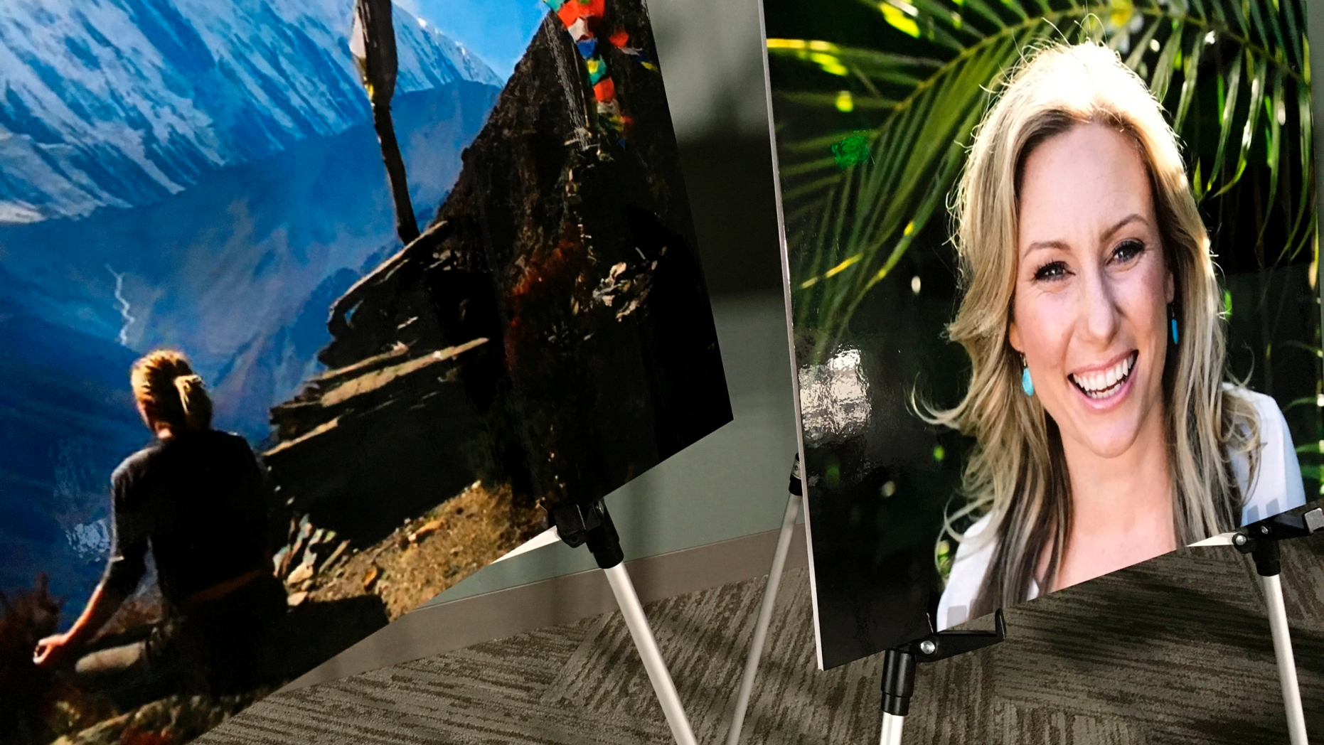 FILE - In this July 23, 2018, file photo, posters of Justine Ruszczyk Damond are displayed at a news conference by attorneys for her family in Minneapolis. The judge overseeing the trial of a former Minneapolis police officer Mohamed Noor who fatally shot the unarmed Australian Ruszczyk Damond, is restricting media and public access. Thirty-three-year-old Noor goes on trial Monday in the July 2017 death of Ruszcyzyk Damond. Judge Kathryn Quaintance ruled Friday, March 29, 2019, that potentially graphic evidence would be seen only by the jury, not the public or media. One media attorney says her ruling could be unconstitutional. (AP Photo/Amy Forliti, File)