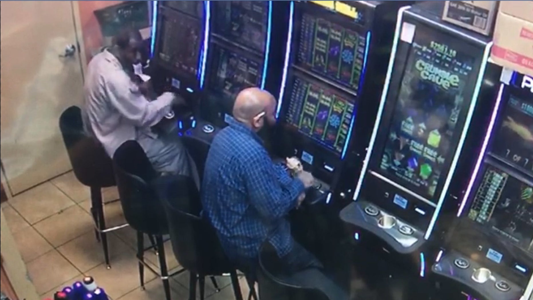 Authorities in Atlanta are searching for a suspect, left, tehy say stole $7,900 from a gas station gamiling machine earlier this month.
