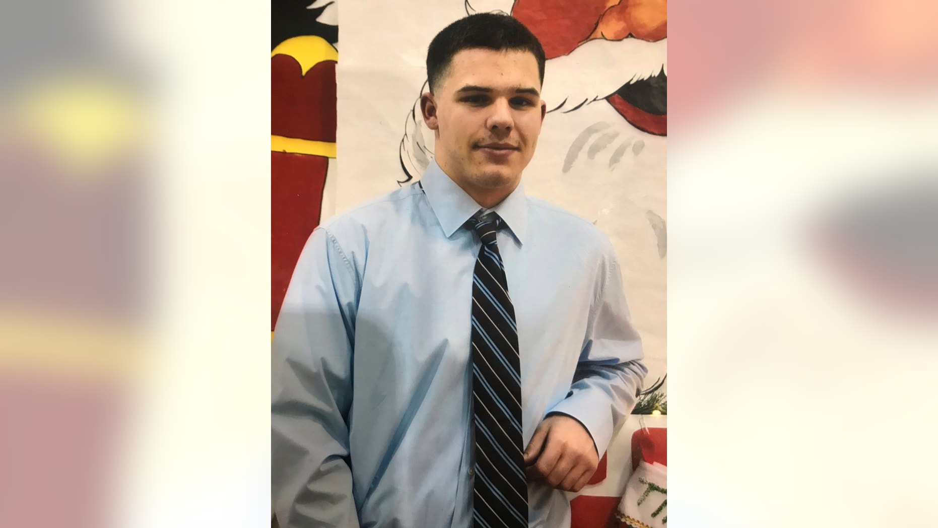 This undated photo released by the Orange County Sheriff's Department shows Ike Souzer, a 15-year-old accused of killing his mother who has escaped a Southern California jail. Probation officials say Souzer escaped from the Orange County Juvenile Hall and jumped a perimeter fence just after midnight, Friday April 12, 2019. The 6-foot-tall, 200-pound teen was wearing red pants and a white shirt and may have an injured leg. (Orange County Sheriff's Department via AP)