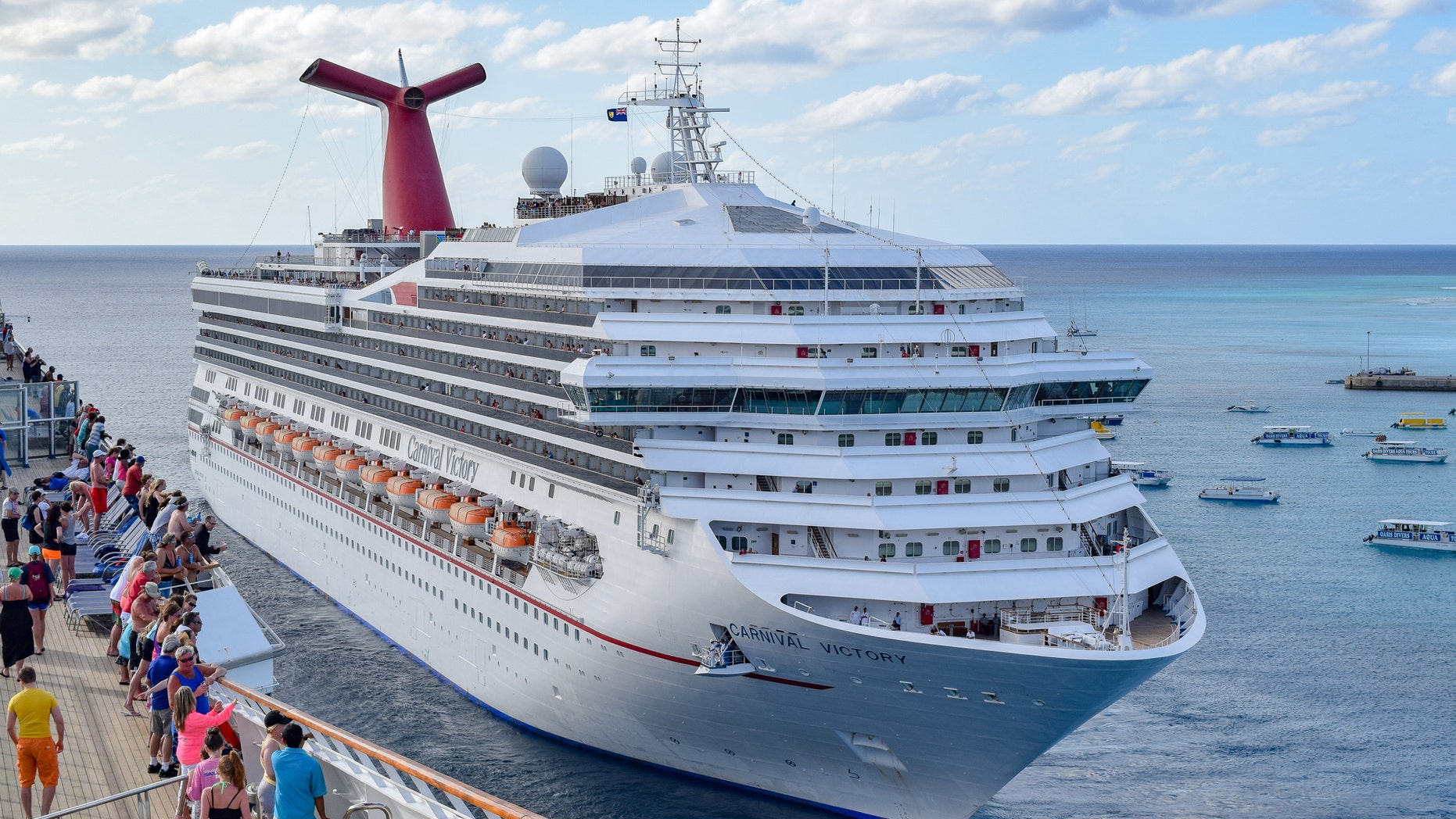 Carnival has said there are "two sides" to the story after a passenger claims his group was banned after getting trapped in the elevator.