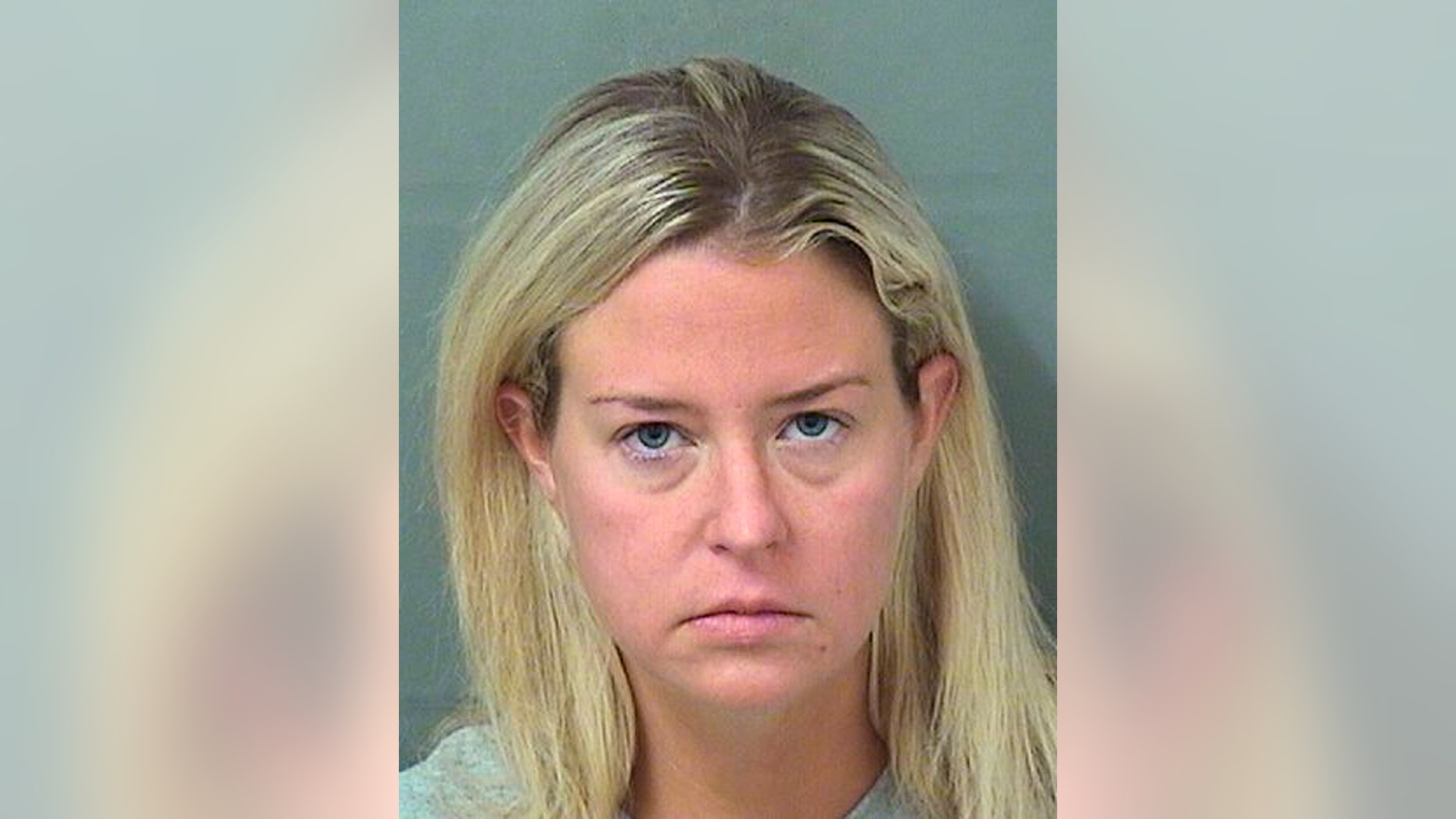This file photo originally provided provided by the Palm Beach County Sheriff's Office shows Kate Major Lohan shortly after her arrest on a battery charge in Boca Raton, Fla., on July 27, 2018. Lohan has pleaded guilty to disorderly conduct after Pennsylvania state police said she tried to commandeer an occupied bus and attacked its driver last Christmas. Lohan apologized while entering the third-degree misdemeanor plea Wednesday, April 17, 2019. Lehigh County prosecutors withdrew other charges including drunken driving. (Palm Beach County Sheriff's Office via AP)