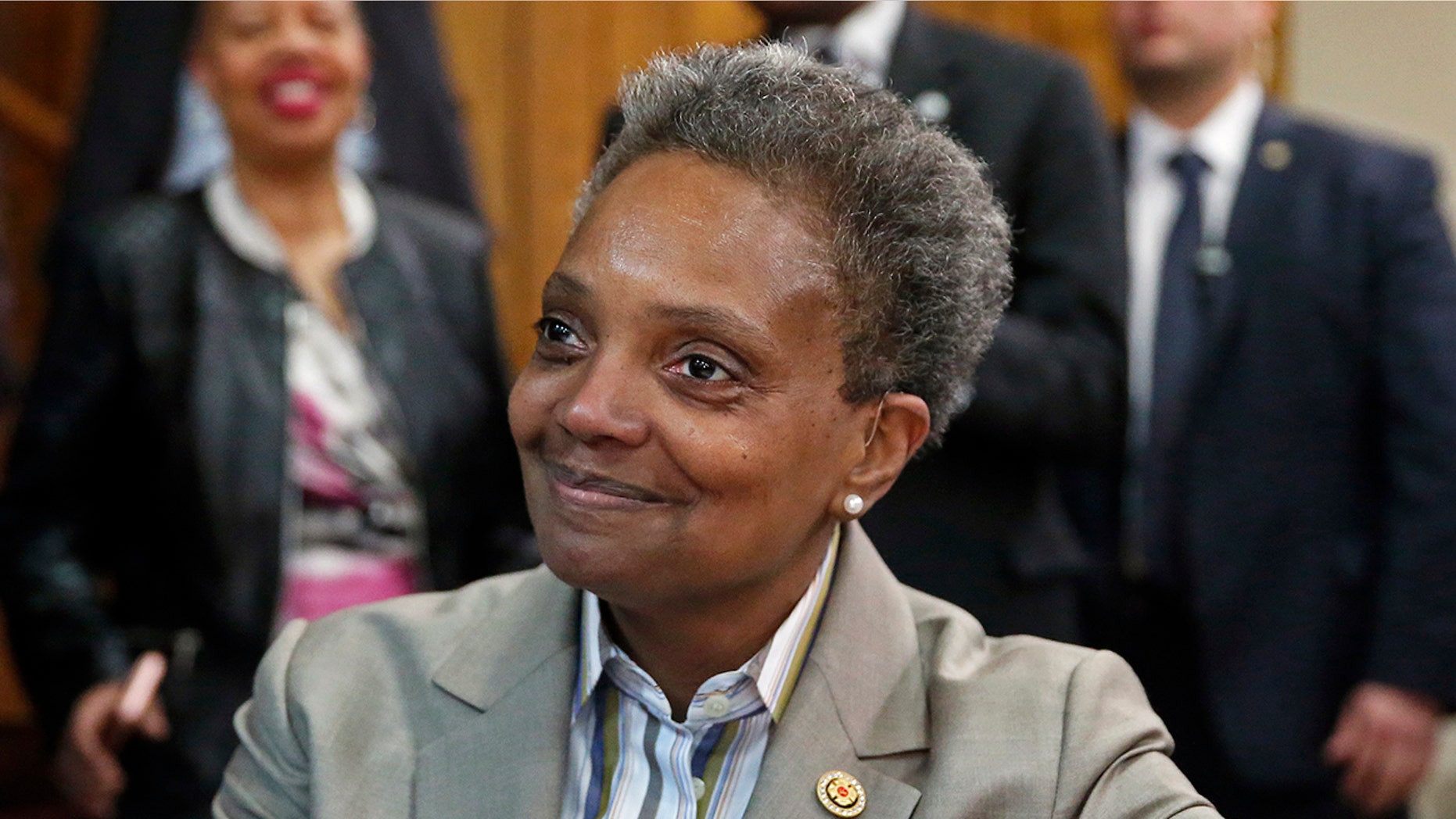 The elected mayor of Chicago, Lori Lightfoot, smiles at a press conference at the Rainbow PUSH organization on Wednesday, April 3, 2019 in Chicago. (AP Photo / Nuccio DiNuzzo)