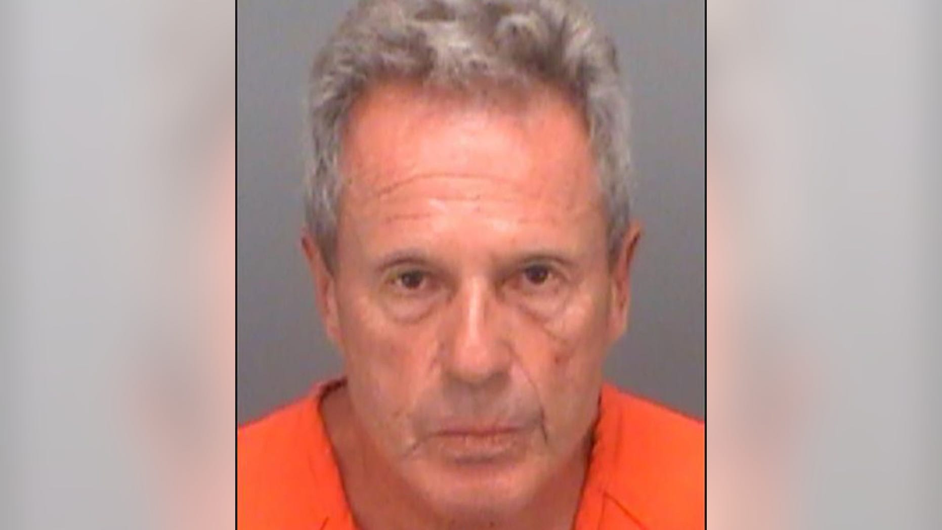 Joel William Benjamin, 71, was arrested for allegedly using a water gun to shoot his own bodily fluids at a woman walking her dog.