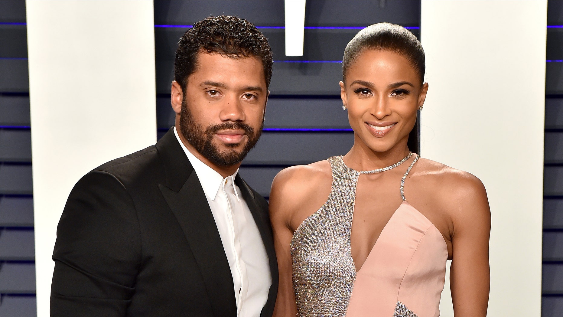 Russell Wilson (L) and Ciara attend the 2019 Vanity Fair Oscar Party