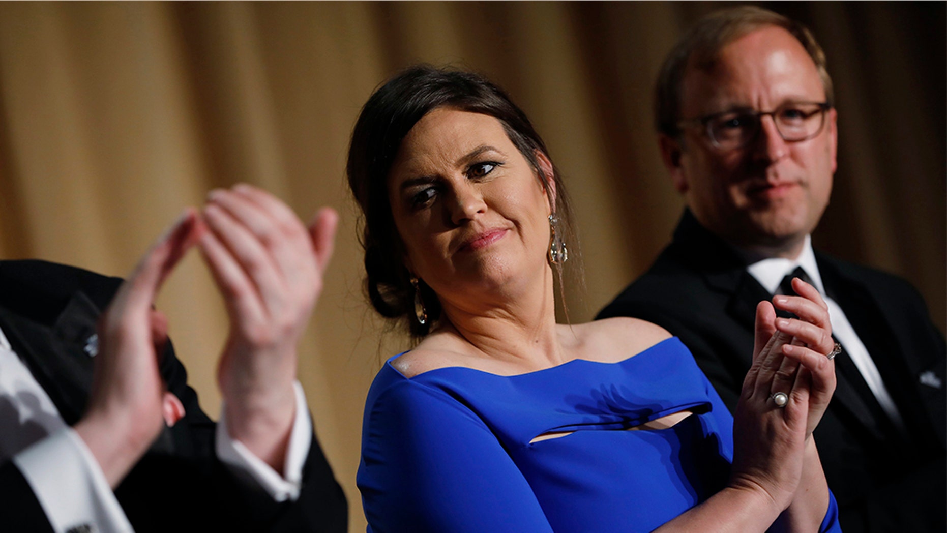 White House Press Secretary Sarah Huckabee Sanders is seen at the White House Correspondents' Association dinner in Washington, U.S., April 28, 2018. REUTERS/Aaron P. Bernstein - HP1EE4U104CHW