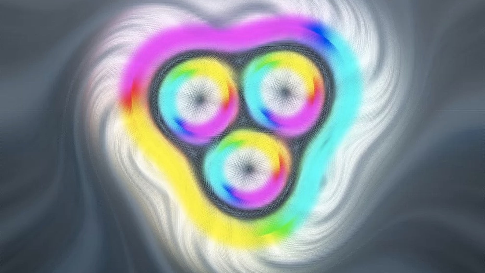 This image comes from a computer simulation of a skyrmion bag containing three skyrmions. White represents magnetic field lines pointing up, black represents lines pointing down, and other colors represent other directions.