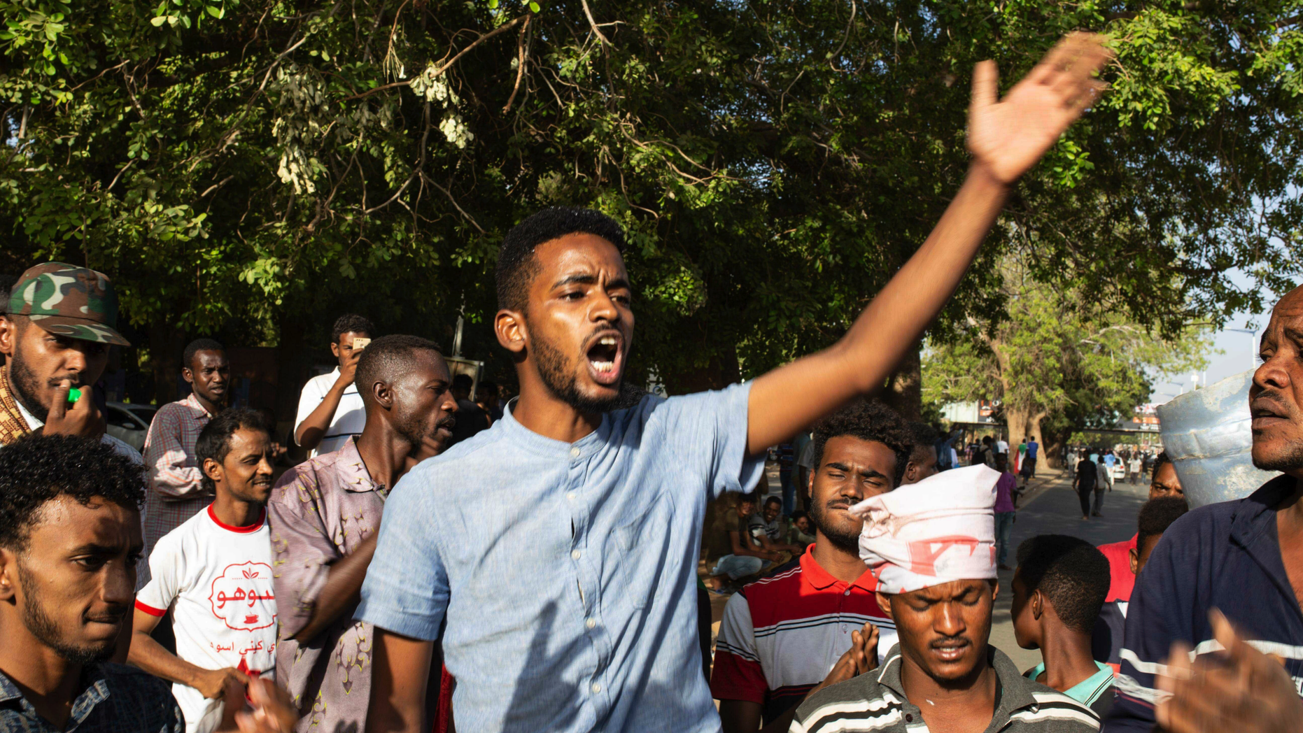 A group of protesters repeat revolutionary chants against military rule and demand the prosecution of members of the ousted government of long-ruling President Omar al-Bashir, at the Armed Forces Square, in Khartoum, Sudan, Tuesday, April 30, 2019. Sudan’s ruling military council on Tuesday warned protesters against any further “chaos” as organizers called for mass rallies later this week. (AP Photos/Salih Basheer)