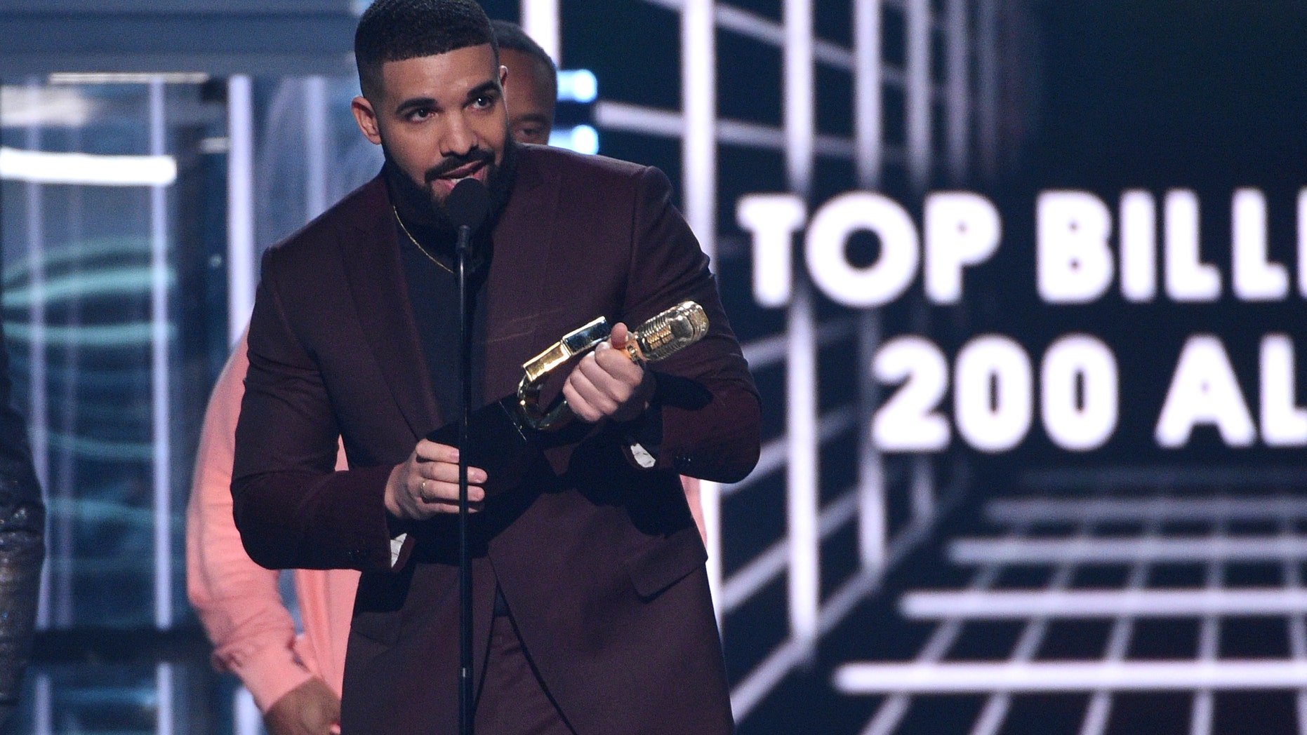 Drake accepts the top billboard 200 album award for