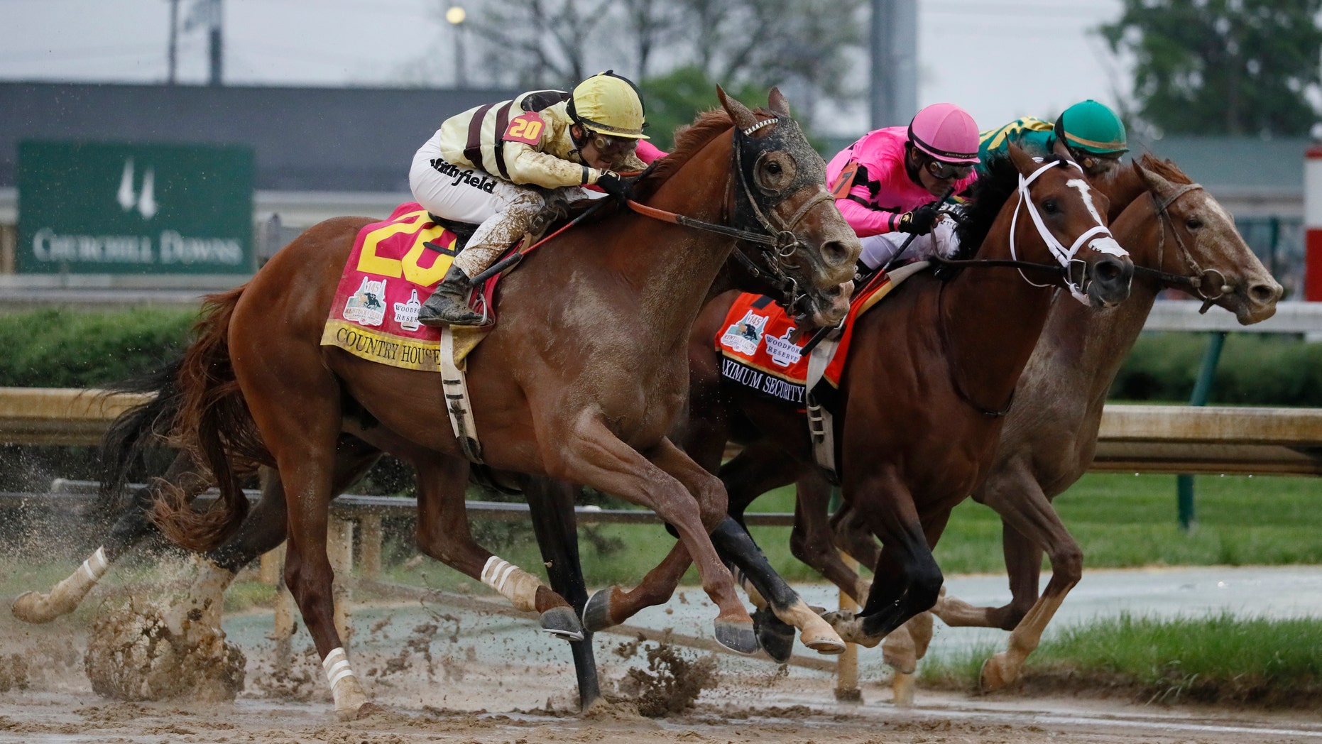 Luis Saez straddles maximum safety, center, to victory at the 145th edition of the Kentucky Derby horse race at Churchill Downs on Saturday, May 4, 2019, in Louisville, Kentucky.
