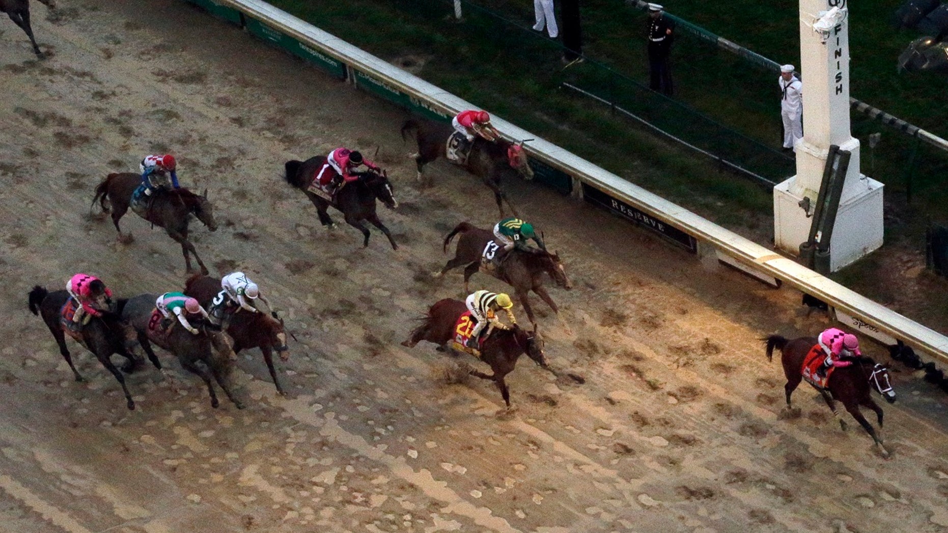 Luis Saez rides Maximum Security across the finish line first followed by Flavien Prat on Country House during the 145th running of the Kentucky Derby horse race at Churchill Downs Saturday, May 4, 2019, in Louisville, Ky. Country House was declared the winner after Maximum Security was disqualified following a review by race stewards. (AP Photo/Charlie Riedel)