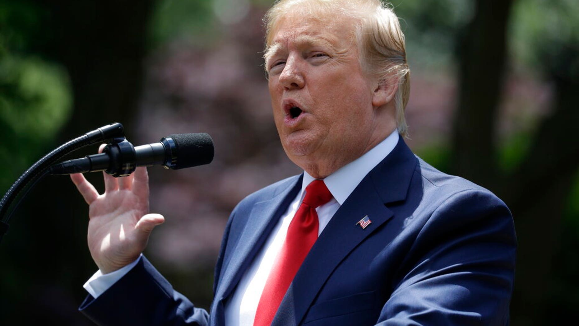 President Donald Trump speaks during the presentation of the Commander-in-Chief's Trophy to the U.S. Military Academy at West Point football team, in the Rose Garden of the White House, Monday, May 6, 2019, in Washington.