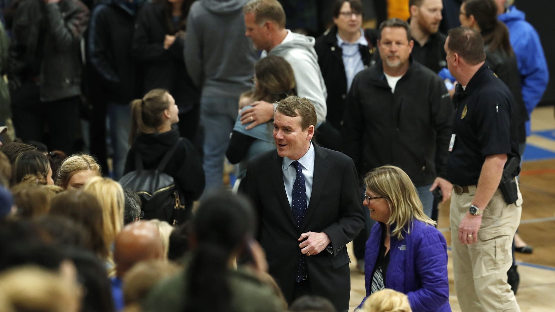 Colorado students walk out of school shooting vigil after politicians take the mic ...