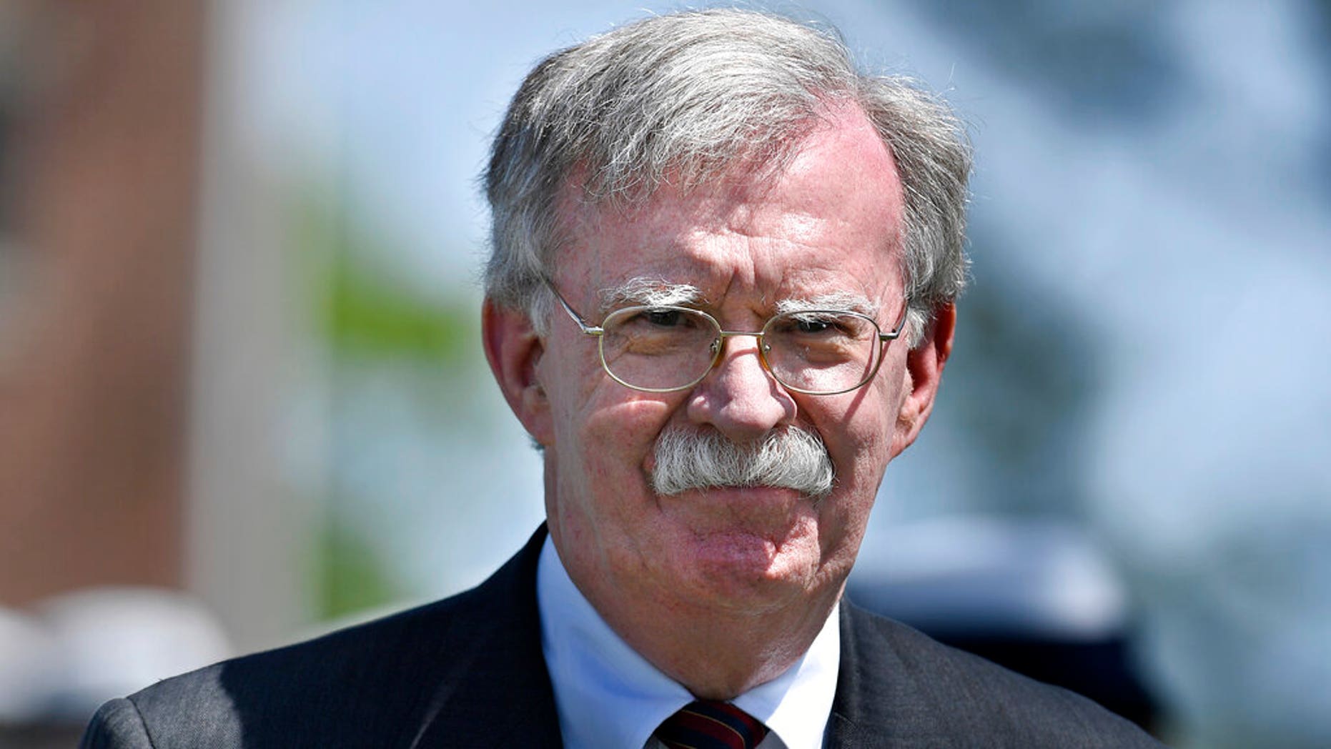FILE: National Security Adviser John Bolton arrives to speak at the commencement for the United States Coast Guard Academy in New London, Conn.