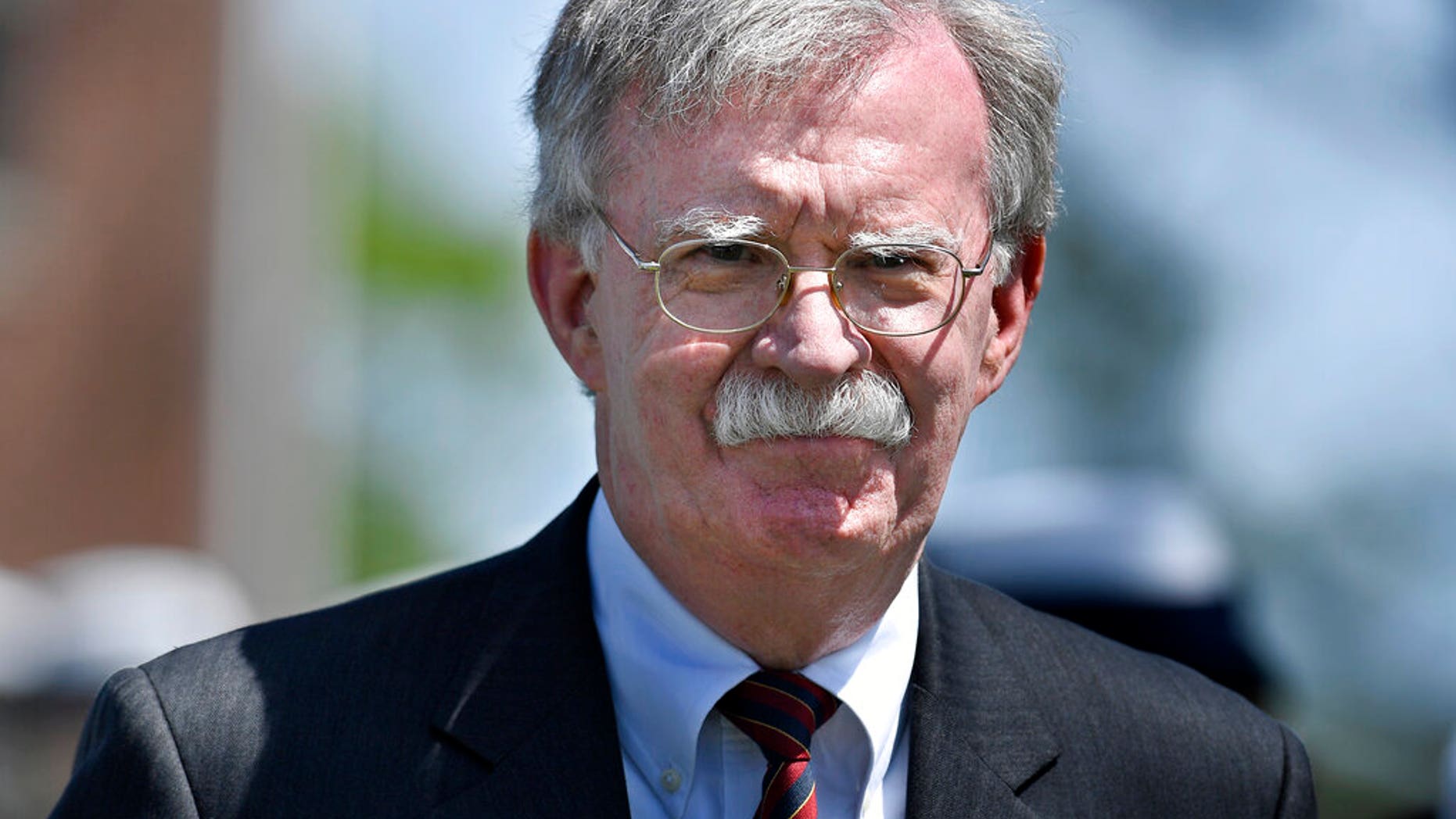 FILE: National Security Adviser John Bolton arrives to speak at the commencement for the United States Coast Guard Academy in New London, Conn.