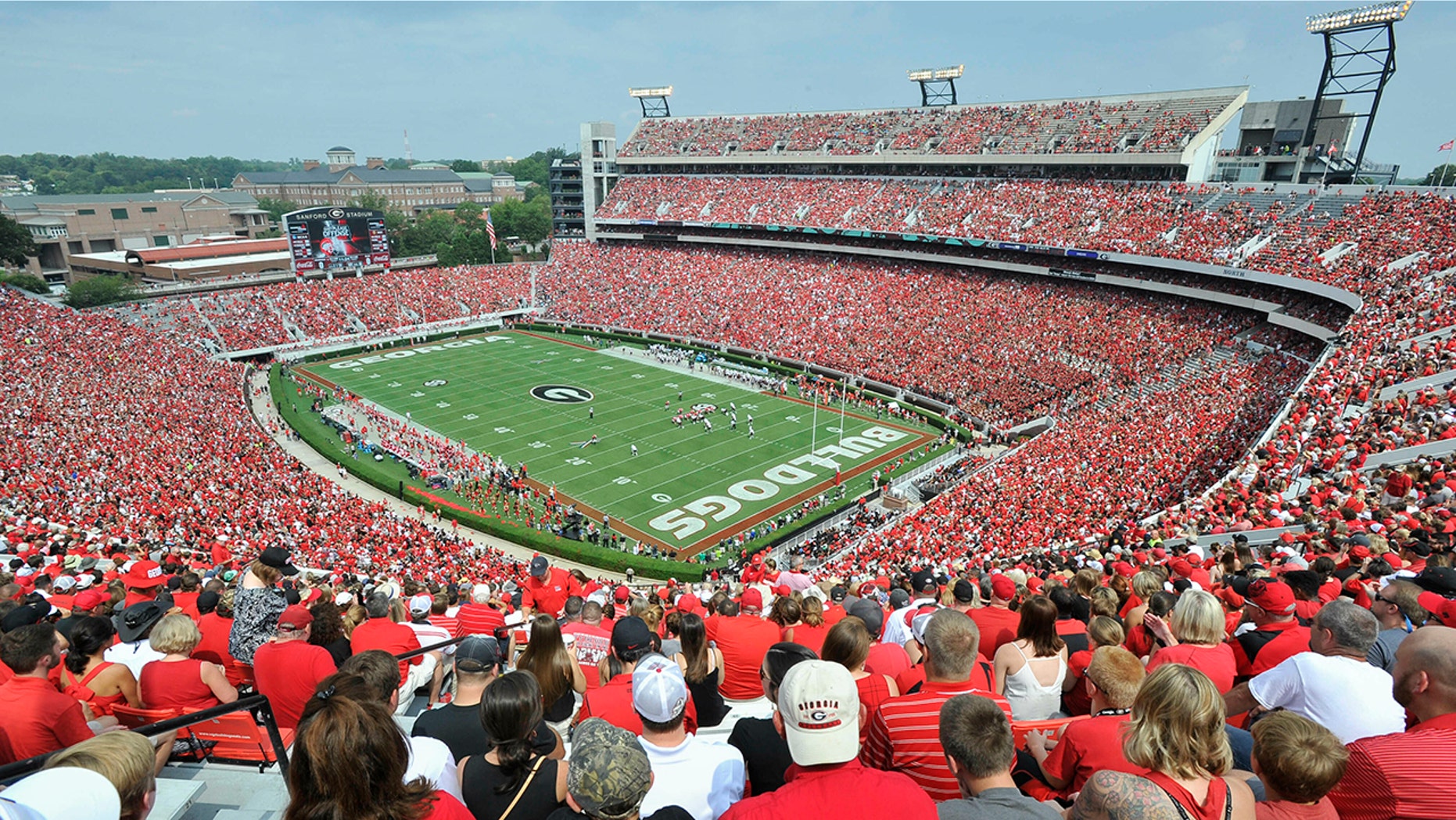 In this Sept. 5, 2015, photo, Georgia fans watch the season opening game against Louisiana Monroe at Sanford Stadium during an NCAA college football game in Athens, Ga. (AP Photo/John Amis)