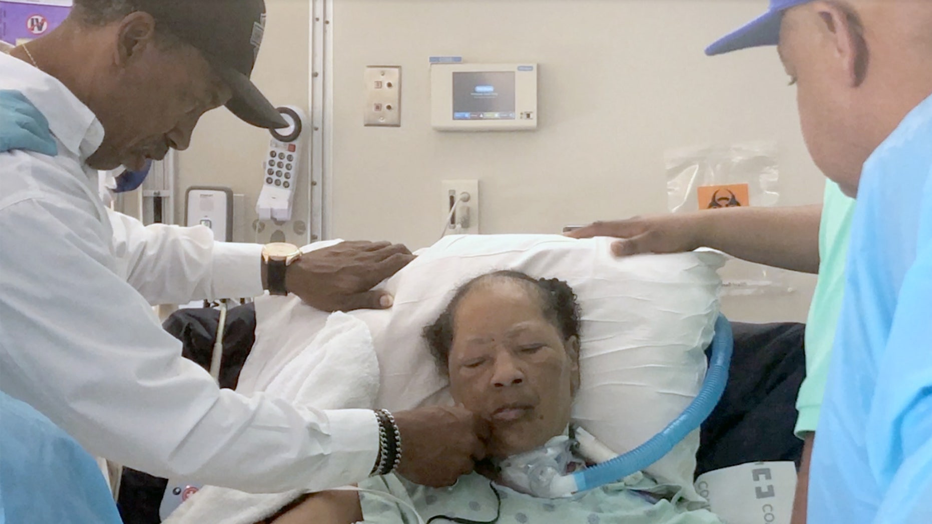 Carolyn Jones, 61, fights for her life after a Houston hospital pulled the plug against her family's wishes. Her husband of 40 years, Donald, is on her left.