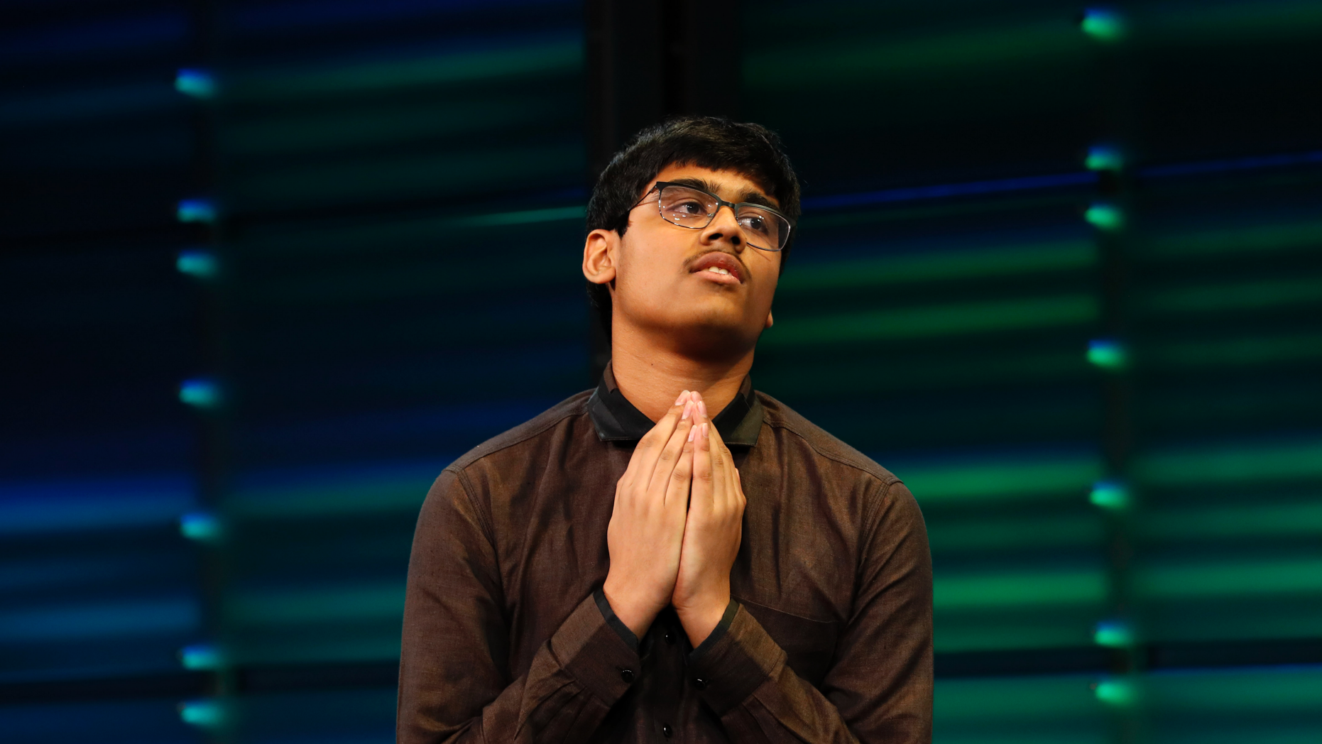 Nihar Janga, 14, from Austin, Texas, responds with a prayer after winning the National Geographic GeoBee on Wednesday, May 22, 2019 at National Geographic in Washington. Janga is also a former co-winner of the National Spelling Bee, in 2016, when he won the tie at the age of eleven. (AP Photo / Jacquelyn Martin)