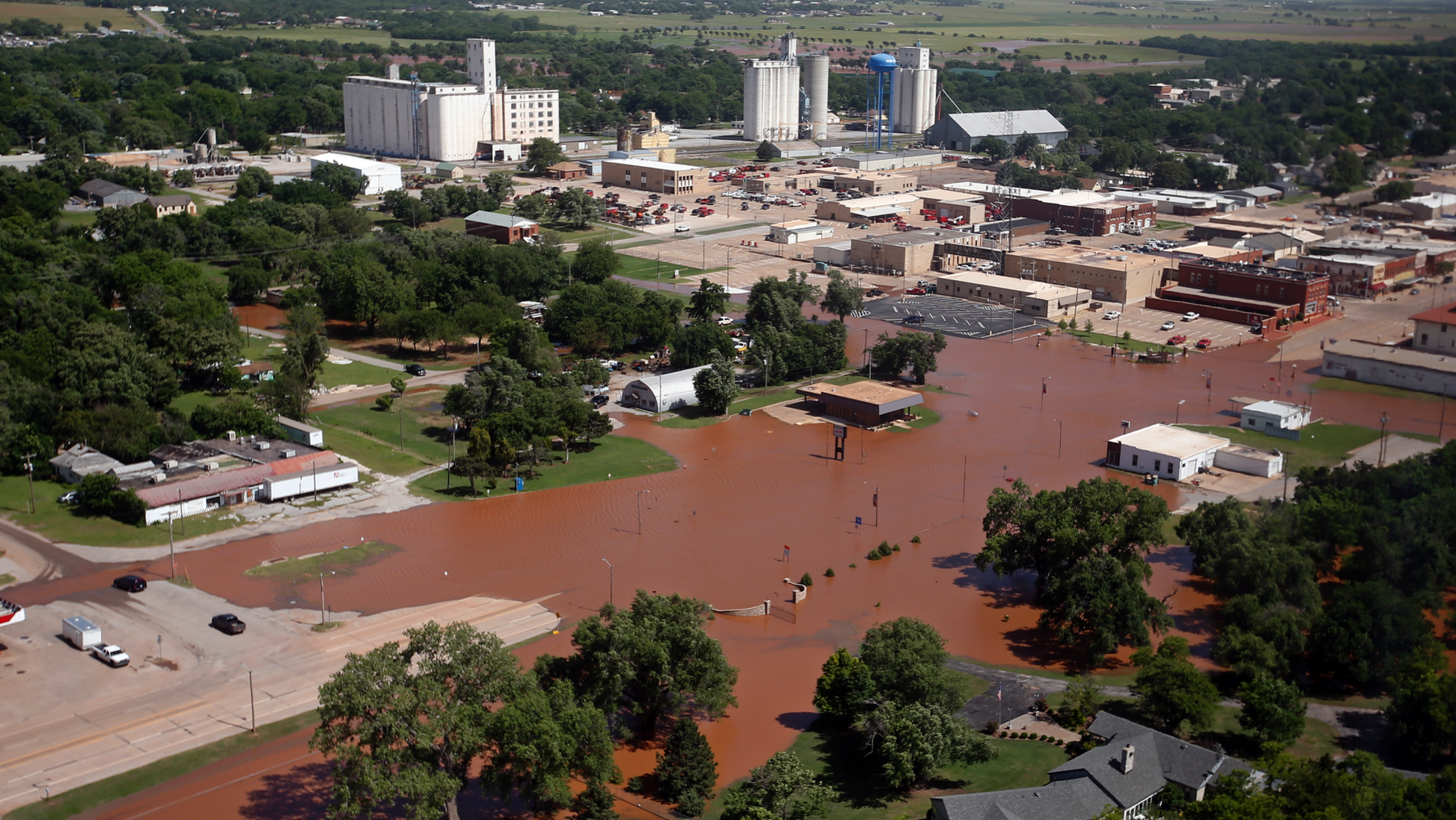 Flooding in Kingfisher, Okla. is pictured Tuesday, May 21, 2019. Flooding following heavy rains was an issue across the state. (AP Photo/Sue Ogrocki)