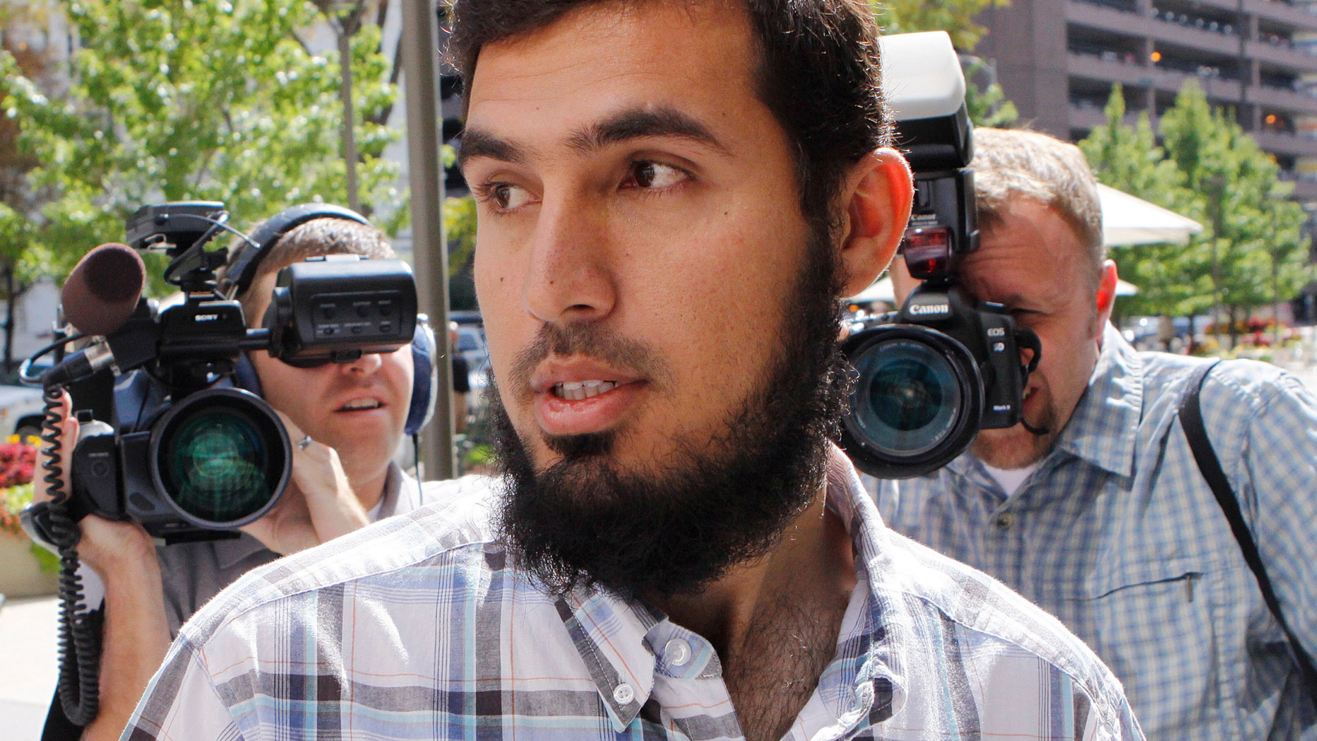 FILE- In this Sept. 17, 2009 file photo, Najibullah Zazi arrives at the offices of the FBI in Denver for questioning. Zazi, the ringleader of a thwarted terror plot to bomb the New York City subways in 2009 is about to find if becoming a government cooperator will pay off when he is sentenced on Thursday, May 2, 2019. His cooperation could earn him a far lighter punishment on charges that carry a maximum of life. (AP Photo/Ed Andrieski, File)