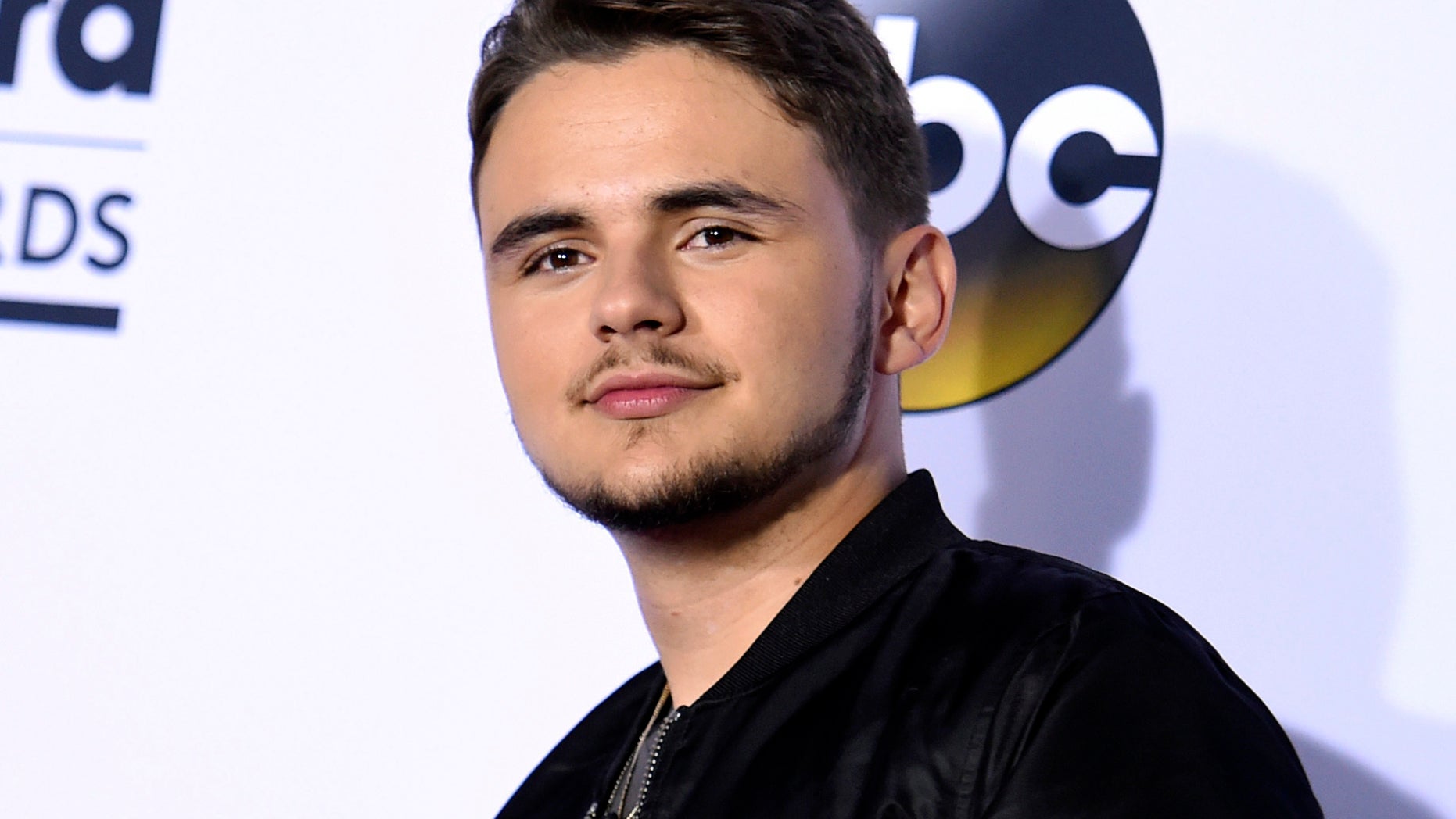 FILE - In this May 21, 2017 file photo, Prince Jackson poses in the press room at the Billboard Music Awards in Las Vegas. Michael Jackson’s eldest child Prince is a college graduate. Twenty-two-year-old Prince Jackson, whose real name is Michael Joseph Jackson Jr. went through commencement ceremonies Saturday, May 11, 2019 at Loyola Marymount University in Los Angeles. (Photo by Richard Shotwell/Invision/AP, File)