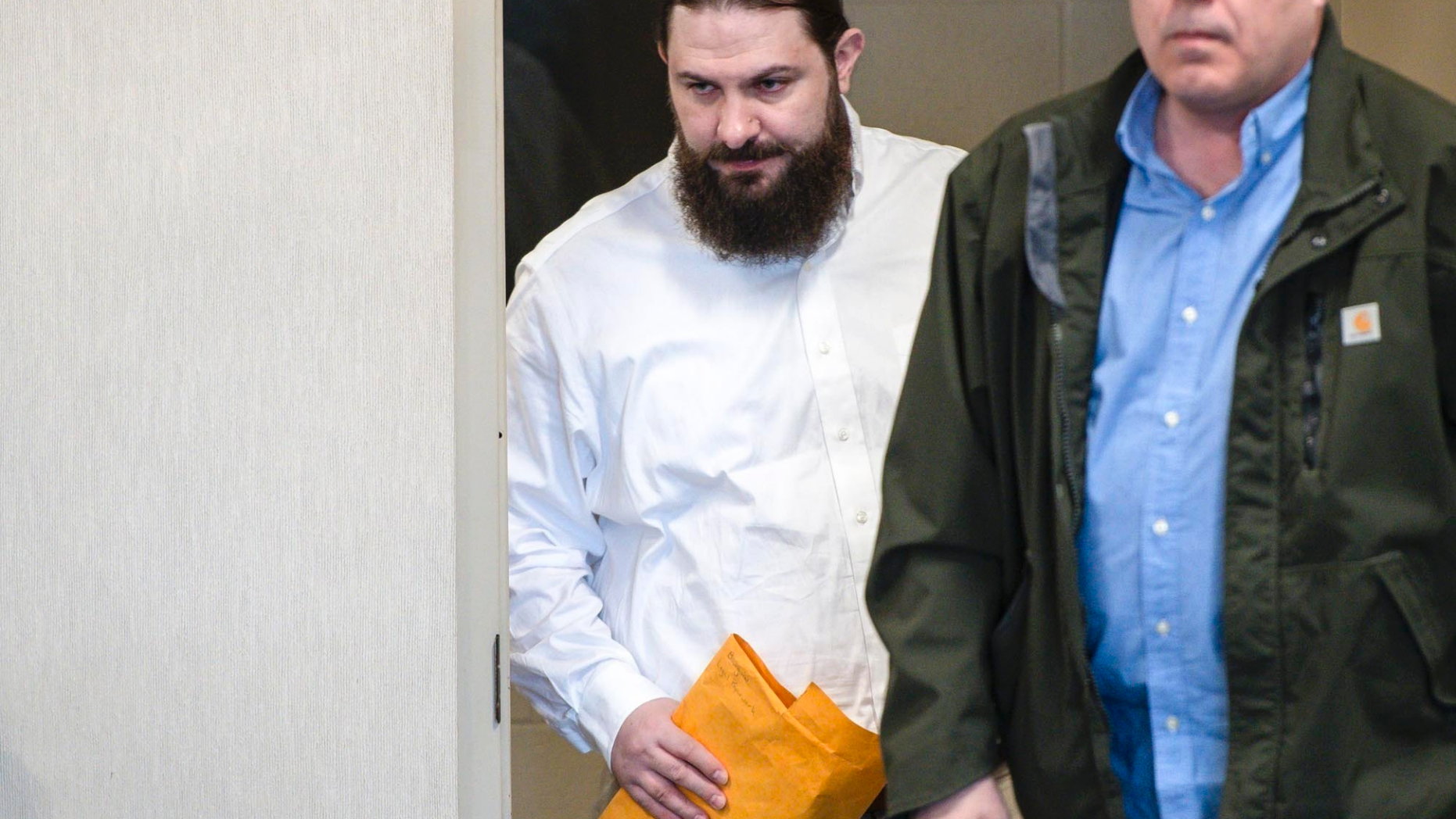FILE - In this May 9, 2019 file Steven Bourgoin arrives for his murder trial in Vermont Superior Court in Burlington, Vt. Bourgoin is facing five counts of second-degree murder for a crash that killed five teenagers on I-89 in Williston in 2016. (Glenn Russell/VTDigger.org via AP, Pool, File)