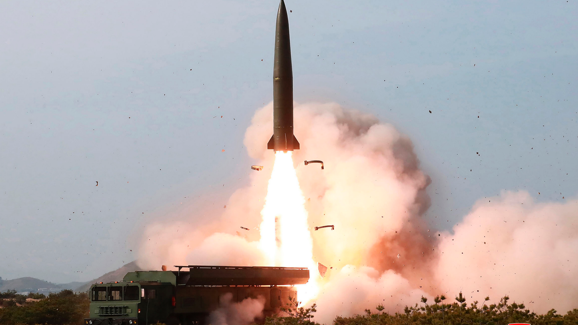 FILE - This May 4, 2019, file photo provided by the North Korean government shows a launch of a missile in the east coast of North Korea. Experts say North Korea’s latest launches suggest it may have acquired or cloned a short-range missile the Russian military has long earmarked for export. It’s still unclear if the North bought them or built them itself, but experts say the missiles it launched over the past week look just like a nuclear-capable ballistic missile that has long been a source of tension in Europe. Korean language watermark on image as provided by source reads: "KCNA" which is the abbreviation for Korean Central News Agency. (Korean Central News Agency/Korea News Service via AP, File)