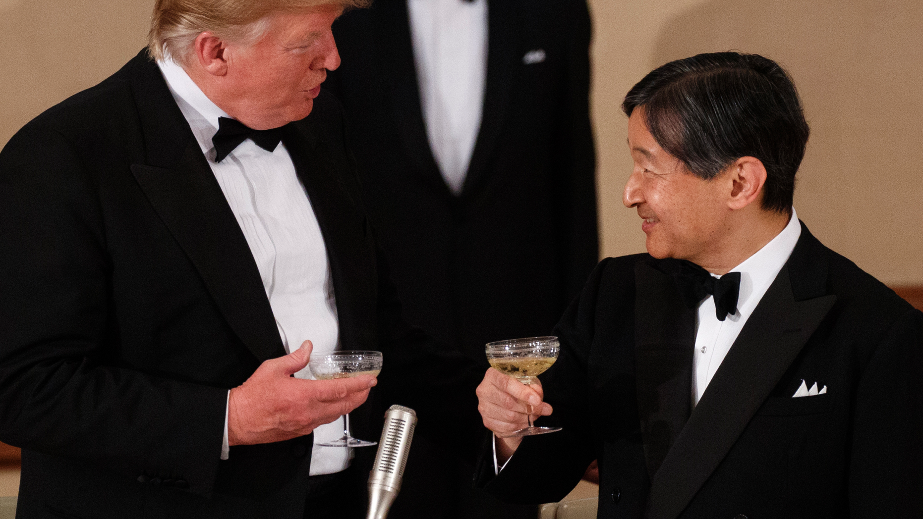 U.S. President Donald Trump toasts with Japan's Emperor Naruhito during a State Banquet at the Imperial Palace, Monday, May 27, 2019, in Tokyo. (AP Photo/Evan Vucci)