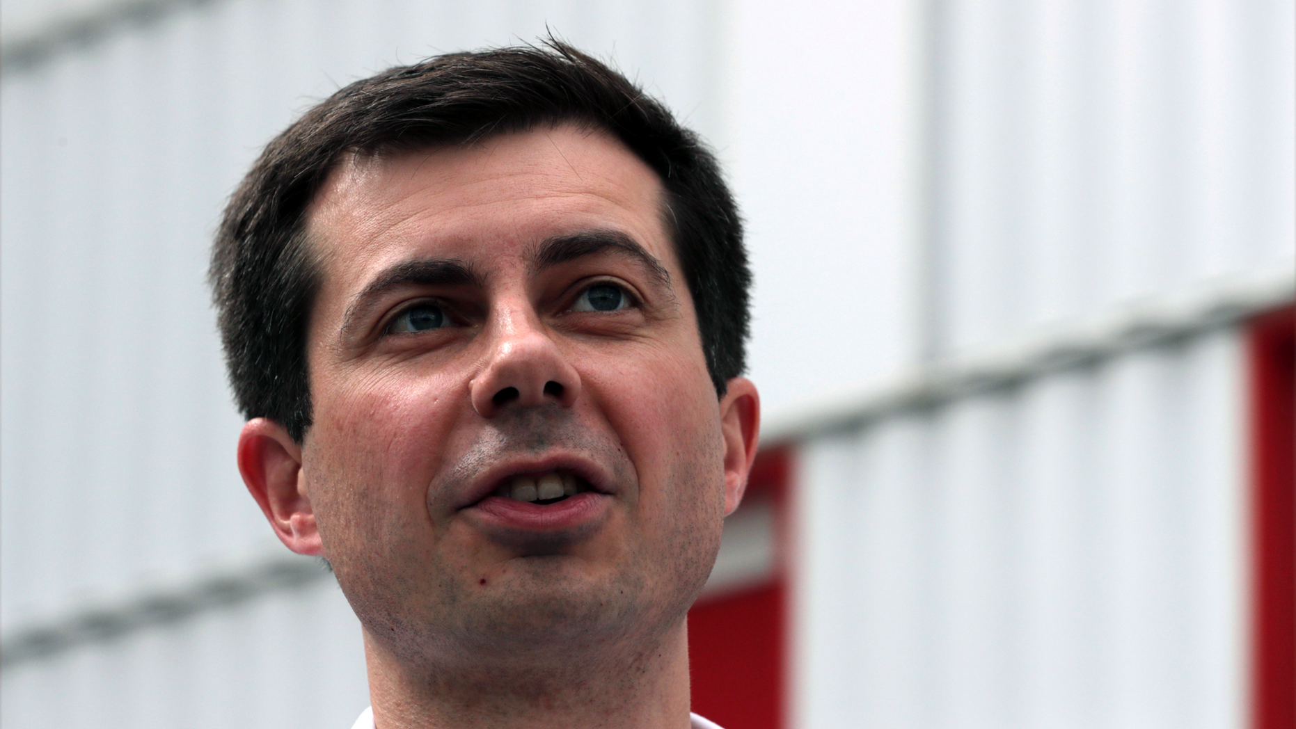FILE - In this April 19, 2019, file photo, Democratic presidential candidate South Bend Mayor Pete Buttigieg during a campaign stop at a dairy company in Londonderry, N.H. The relatively few Democratic presidential candidates from red states have taken different approaches to convincing voters that a familiarity with Donald Trump country could help them denying him a second term. (AP Photo/Charles Krupa, File)