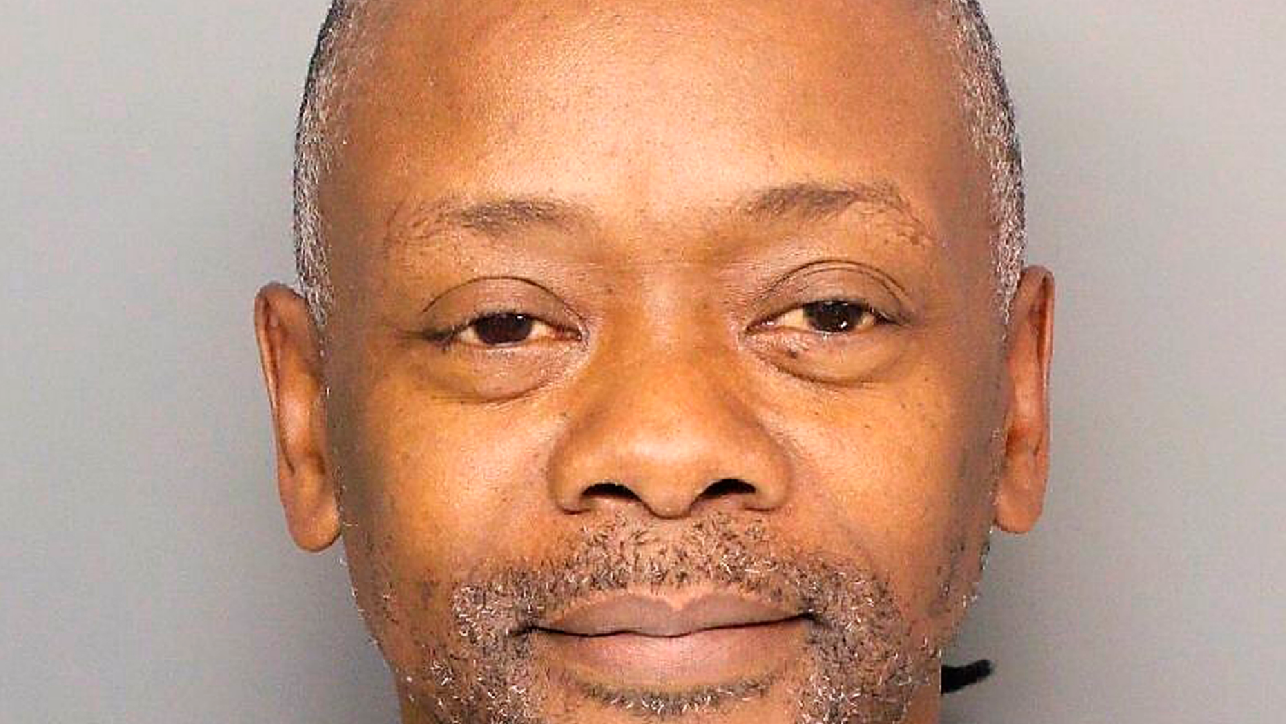This undated photo provided by the Greenville Police Department in South Carolina shows Brian Keith Munns. Authorities said Monday, May 6, 2019, they have arrested Munns, who they say stabbed an 80-year-old woman to death in her South Carolina home more than 30 years earlier. (Greenville Police Department via AP)