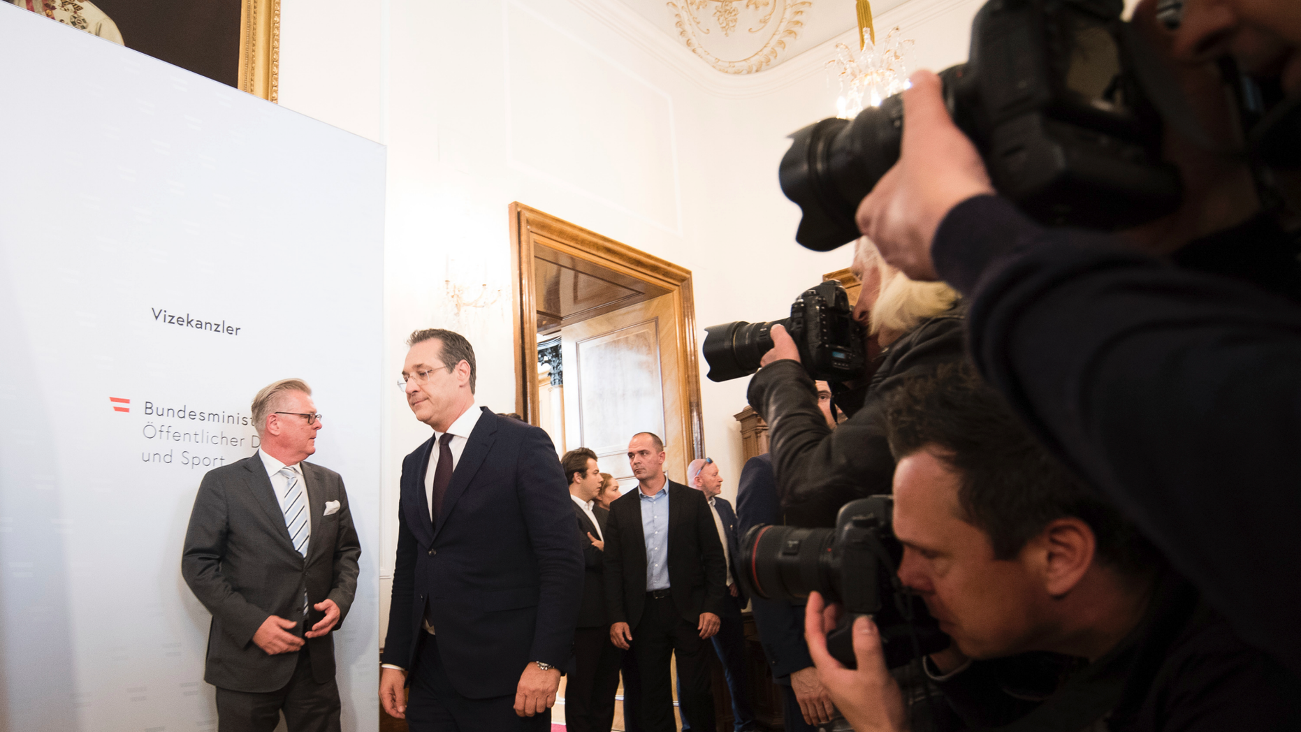 FILE - In this Saturday, May 18, 2019 file photo, Austrian Vice Chancellor Heinz-Christian Strache (Austrian Freedom Party), second left, arrives for a press conference at the sport ministry in Vienna, Austria. The European Parliament elections have never been so hotly anticipated or contested, with many predicting that this year’s ballot will mark a coming-of-age moment for the euroskeptic far-right movement. The elections start Thursday May 23, 2019 and run through Sunday May 26 and are taking place in all of the European Union’s 28 nations. (AP Photo/Michael Gruber, File)