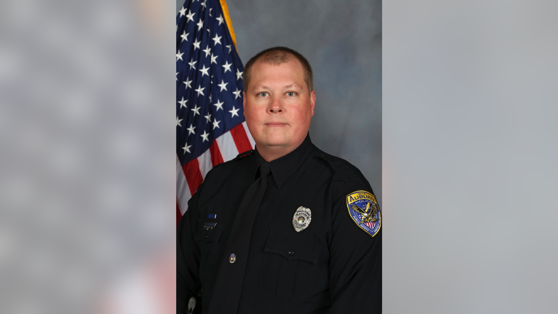 This undated photo provided by the Auburn Police Department shows Officer William Buechner, who was killed while responding to a domestic disturbance report on Sunday, May 19, 2019. Grady Wayne Wilkes, who opened fire on police Sunday night, killing Buechner and wounding two other officers, was arrested Monday, May 20 and charged with capital murder, authorities said. (Auburn Police Department via AP)