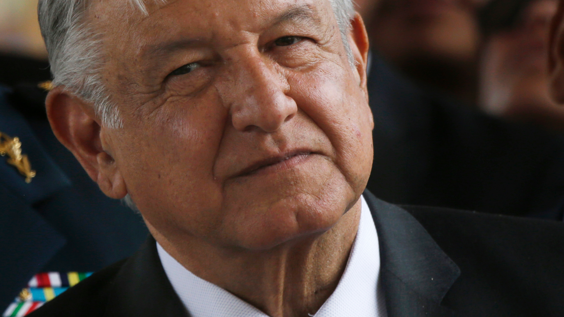 FILE - In this April 29, 2019 file photo, Mexican President Andrés Manuel López Obrador attends a ceremony at the Military Airbase Number 1 in Santa Lucia, on the outskirts of Mexico City. López Obrador said on Monday, May 20, 2019 that the government is ending tax forgiveness, which for years had been a gift to the country’s biggest taxpayers. (AP Photo/Marco Ugarte, File)