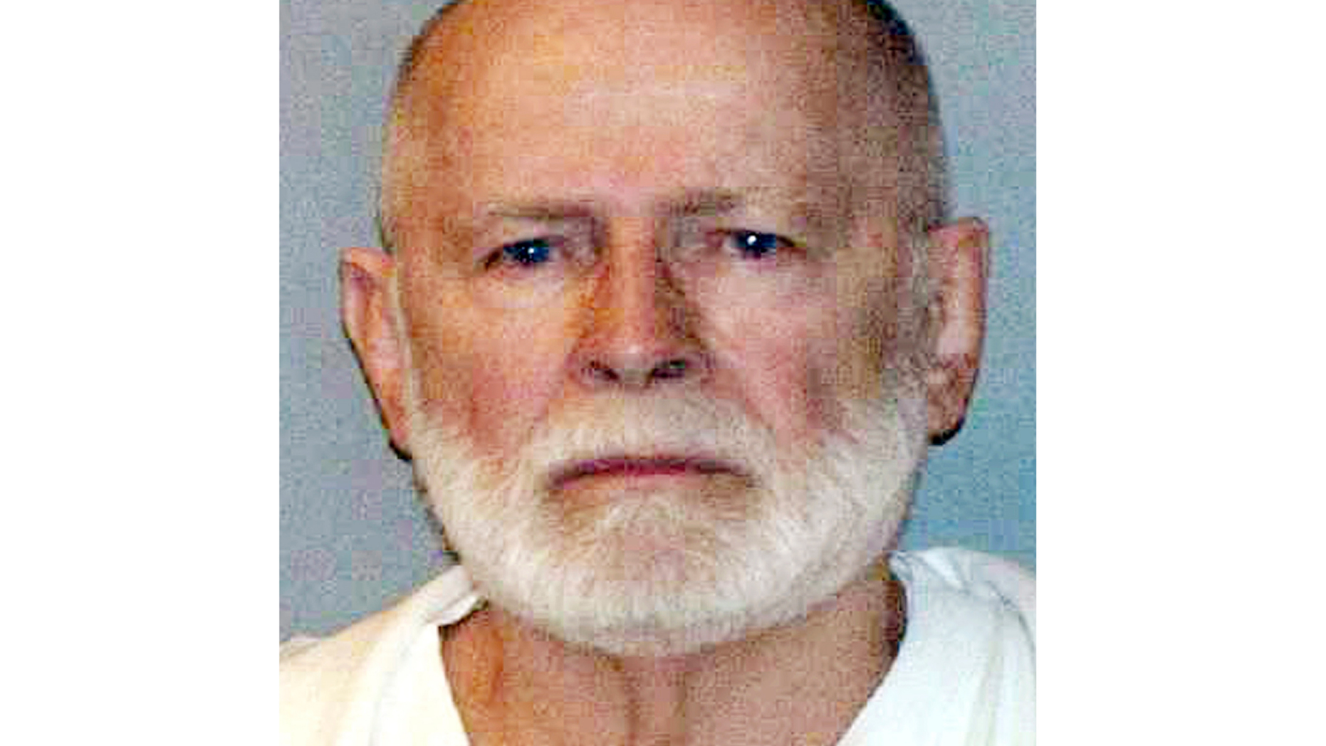 FILE - This June 23, 2011, file booking photo provided by the U.S. Marshals Service shows James "Whitey" Bulger. Jailhouse letters from the late Boston gangster highlight his will to live despite deteriorating health including eight heart attacks. The letters provided to The Boston Globe by a California woman he corresponded with appear to contradict federal officials who have said Bulger’s health had dramatically improved, making him eligible for a transfer to a West Virginia prison where he was killed. Bulger was 89 when he was fatally beaten last October. (U.S. Marshals Service via AP, File)