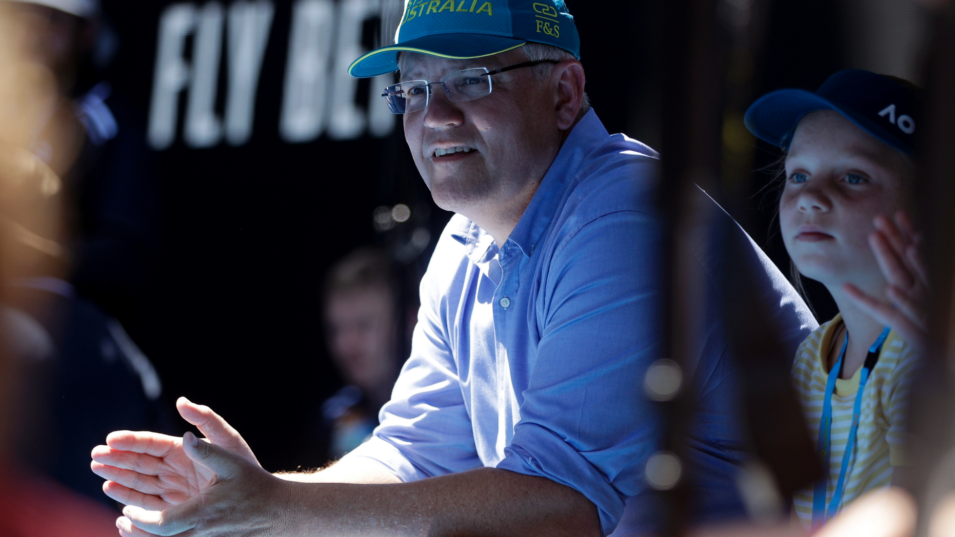 FILE - In this Jan 20, 2019, file photo, Australian Prime Minister Scott Morrison watches the fourth round match between Australia's Ashleigh Barty and Russia's Maria Sharapova on Rod Laver Arena at the Australian Open tennis championships in Melbourne, Australia. Saturday, May 18, 2019 is the last possible date that Morrison could have realistically chosen to hold an election. (AP Photo/Mark Schiefelbein, File)
