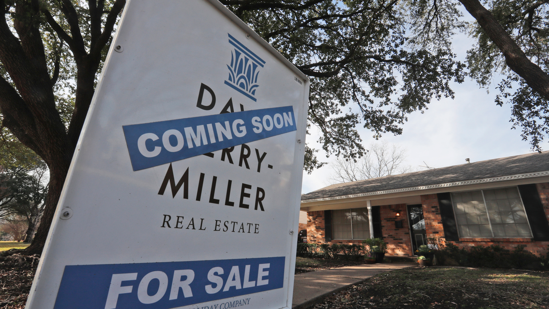 FILE- In this Feb. 20, 2019, file photo a coming soon for sale sign sits in front of a home in the Dallas suburb of Richardson, Texas. On Thursday, May 2, Freddie Mac reports on this week’s average U.S. mortgage rates. (AP Photo/LM Otero, File)