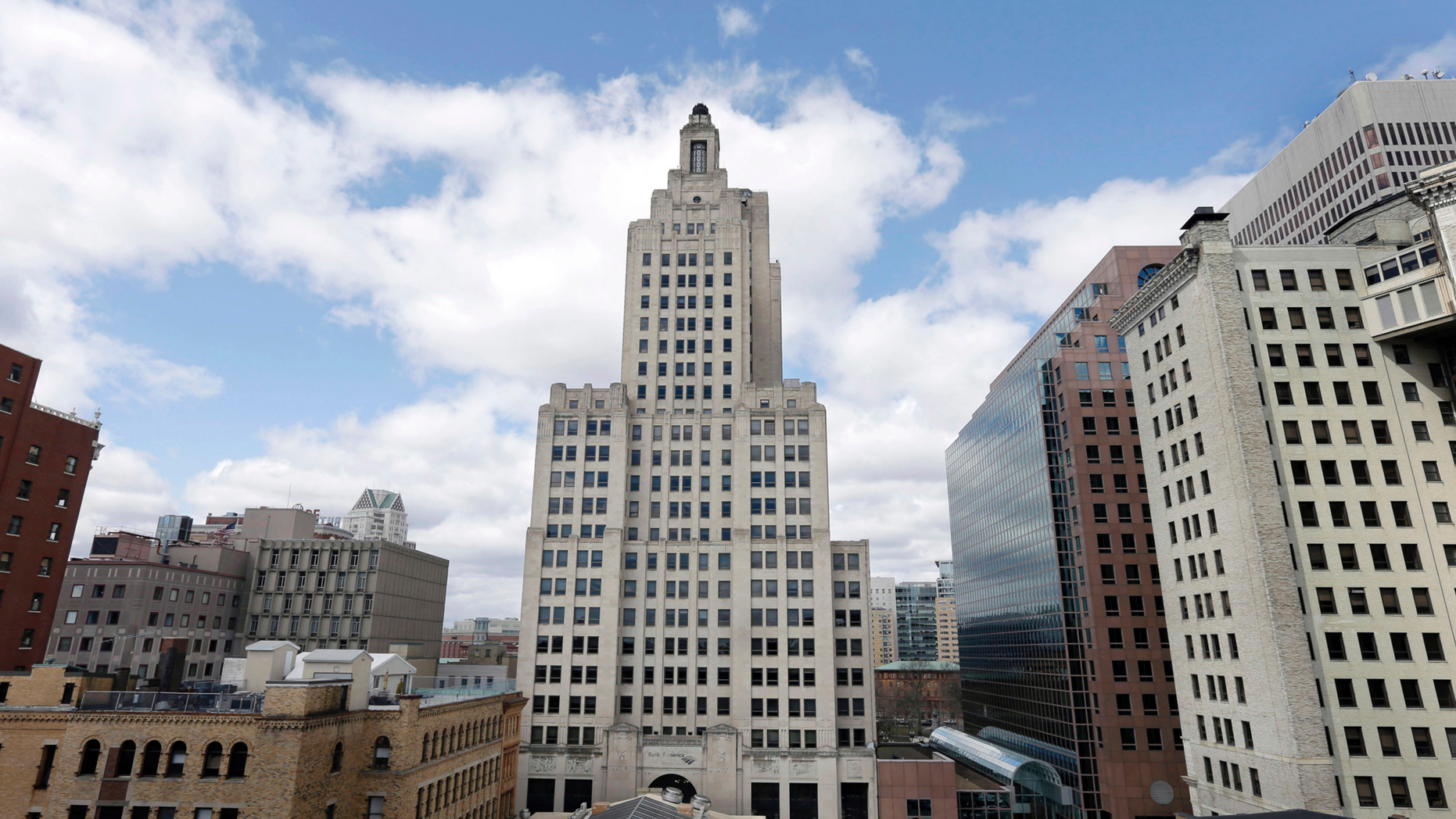 FILE - In this March 27, 2013 file photo the so-called Superman building, center, stands among other buildings in downtown Providence, R.I. Preservationists plan a discussion on the status of Rhode Island's tallest building Thursday, May 30, 2019. (AP Photo/Steven Senne, File)