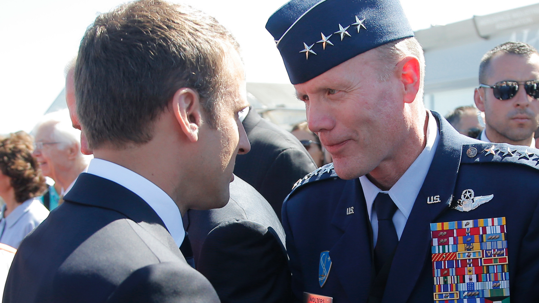 FILE - In this June 19, 2017 file photo, French President Emmanuel Macron, meets with Gen. Tod Wolters, while visiting the Paris Air Show in Le Bourget, north of Paris. At ceremonies Thursday in Germany and Friday in Belgium, Air Force Gen. Tod Wolters will take over for Army Gen. Curtis Scaparrotti as head of U.S. European Command and as NATO’s Supreme Allied Commander Europe. Scaparrotti is retiring. (AP Photo/Michel Euler, Pool)