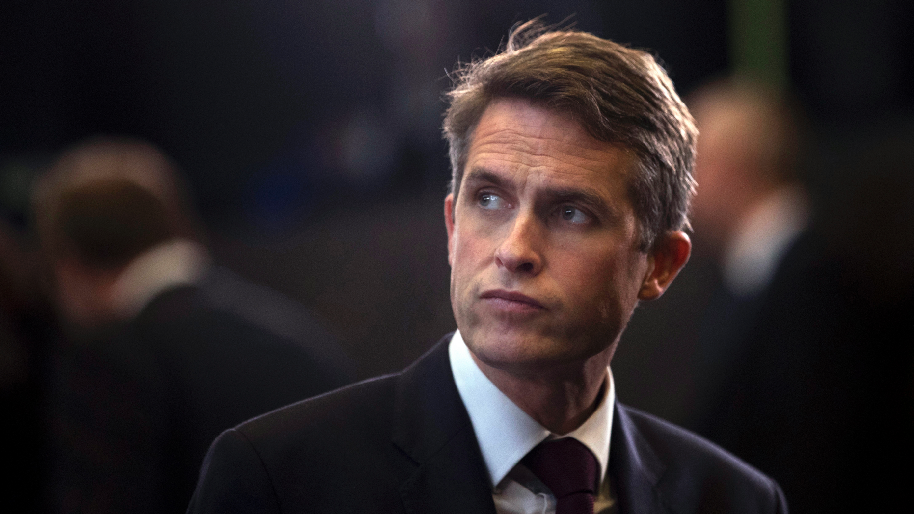 FILE - In this Thursday, Oct. 4, 2018 file photo, Britain's Defence Minister Gavin Williamson stands in the main chamber during a gathering of NATO defence ministers at NATO headquarters in Brussels. British Defense Secretary Gavin Williamson has been fired Wednesday, May 1, 2019 after an investigation into leaks from a secret government meeting about Chinese telecoms firm Huawei. Prime Minister Theresa May's office says May has "lost confidence" in Williamson. (AP Photo/Francisco Seco, file)
