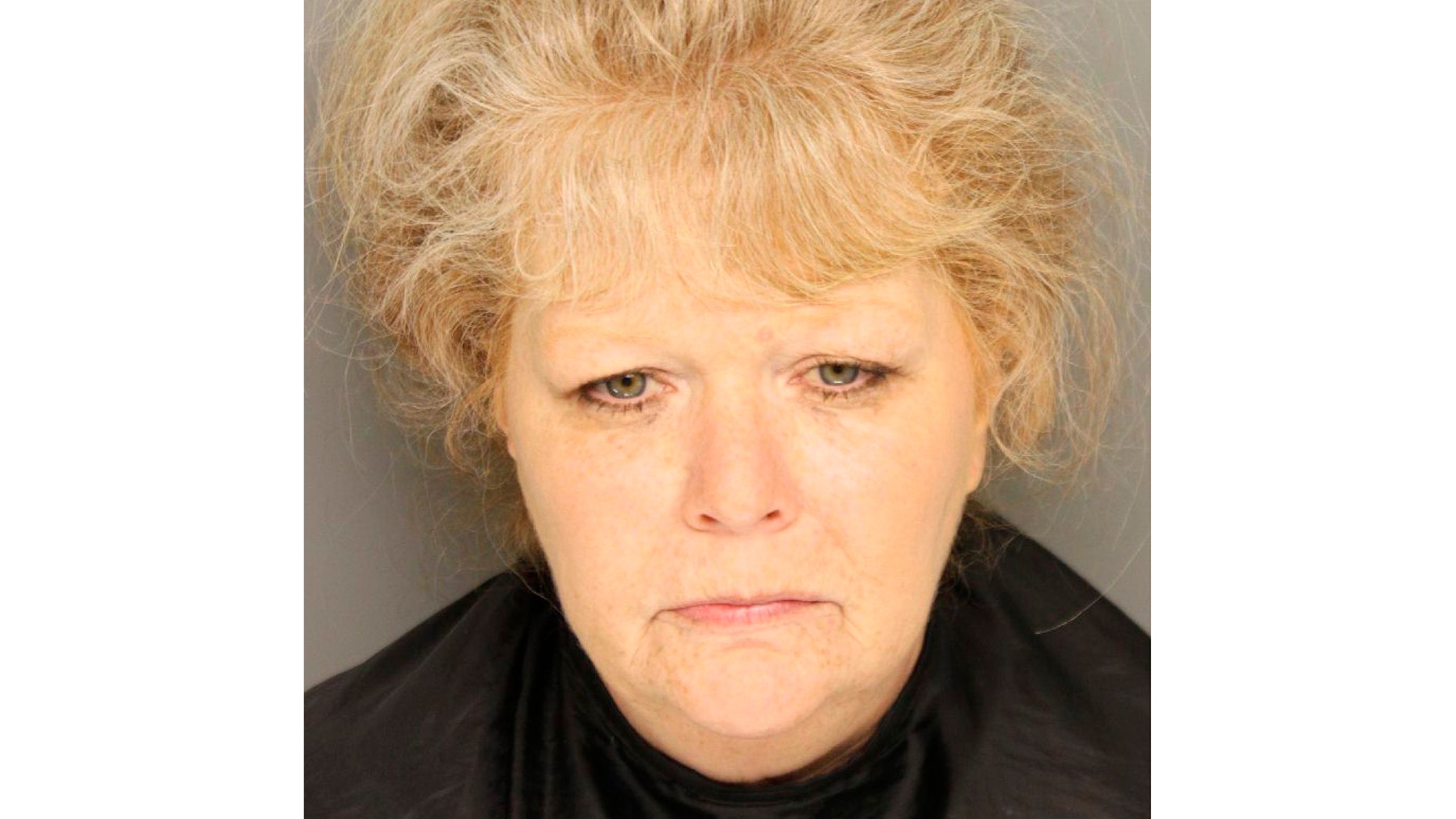 This undated photo provided by the Greenville County Jail shows Brook Graham. Authorities say Graham, a mother already facing a murder charge for abandoning her baby daughter in 1990, is now charged with dumping the body of her infant son nearly a year earlier. (Greenville County Jail via AP)