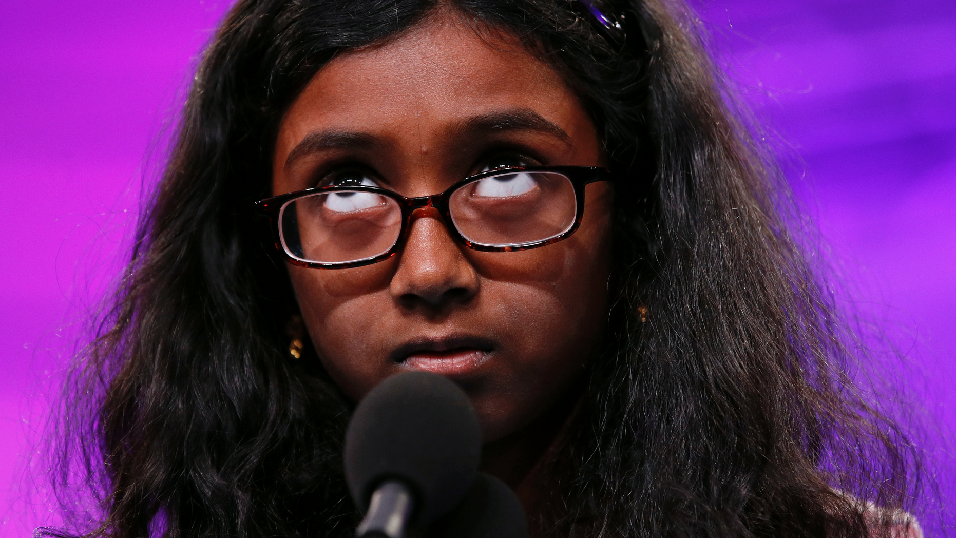 Nithika Rangan, 9, of Elk Grove, Calif., competes in the second round of the Scripps National Spelling Bee, Tuesday, May 28, 2019, in Oxon Hill, Md. (AP Photo/Patrick Semansky)