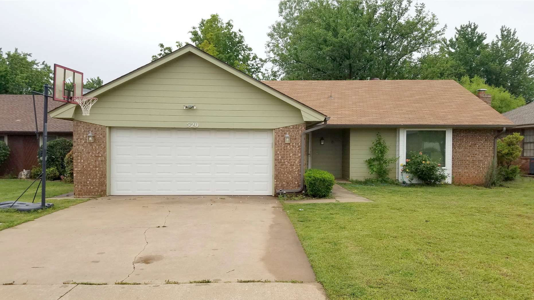 This May 1, 2019 photo shows the Edmond, Okla. home where police say a naked 17-year-old high school student, Isaiah Mark Lewis, was fatally shot Monday, after forcing his way inside. Police in the Oklahoma City suburb say two officers, Sgt. Milo Box and Officer Denton Scherman were not wearing body cameras when at least one of them fatally shot the unarmed teenager. Box has worked at the department for 17 years, and Scherman was hired in September. (AP Photo/Ken Miller)