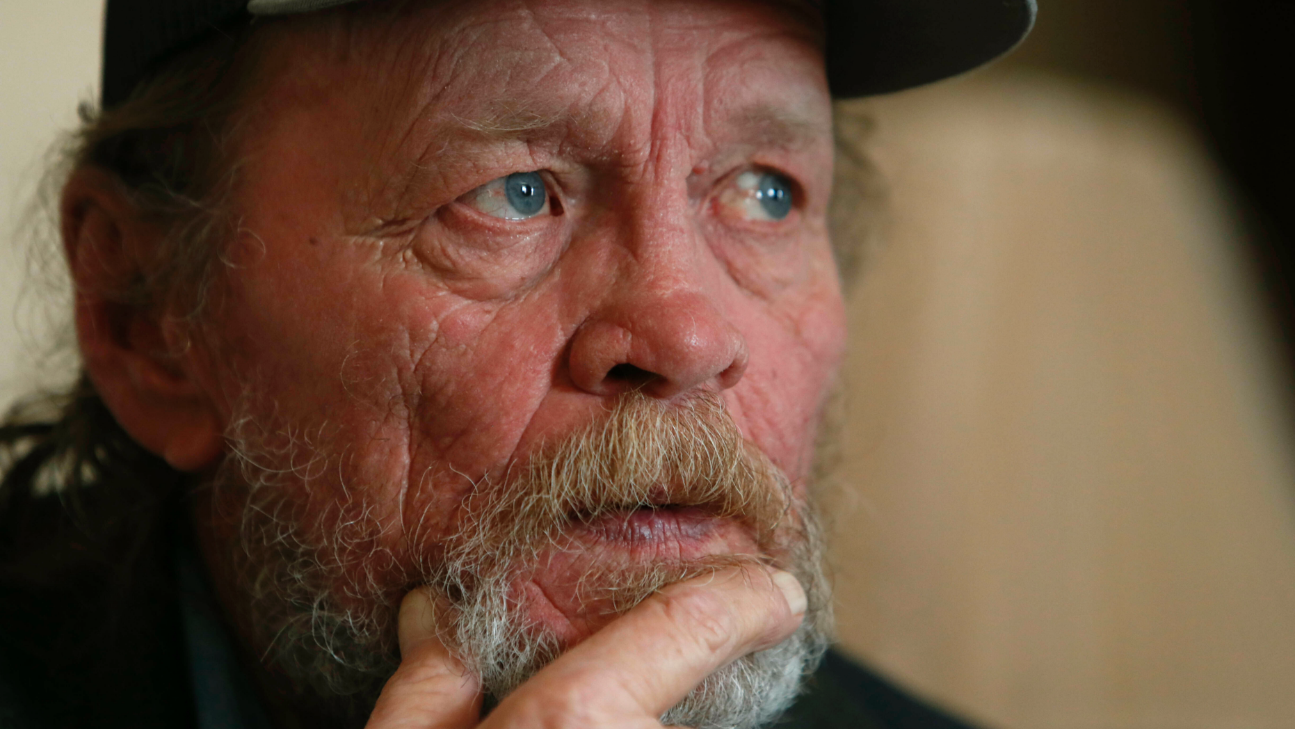 In this Friday, March 22, 2019 photo, Allan Votaw, 66, pauses as he recalls and describes the years of abuse he suffered at the Cal Farley's Boys Ranch during an interview at this home in Kingston, Okla. Votow says his childhood years of 1957-1967 at the famed ranch near Amarillo, Texas were marked with horrible abuses against himself, his two brothers and numerous other boys placed under care of the rural institution. (AP Photo/LM Otero)