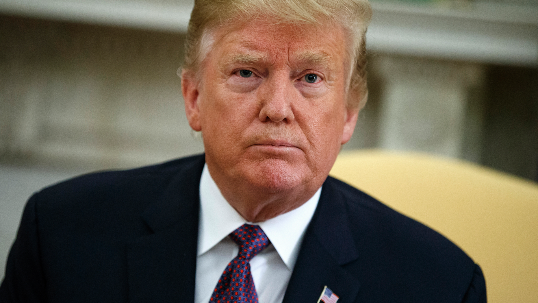 In this May 13, 2019, photo, President Donald Trump listens to a question during a meeting with Hungarian Prime Minister Viktor Orbán in the Oval Office of the White House in Washington. A federal judge in Washington is set to hold a hearing on May 14 on Trump’s attempt to block a House subpoena seeking his financial records. (AP Photo/Evan Vucci)