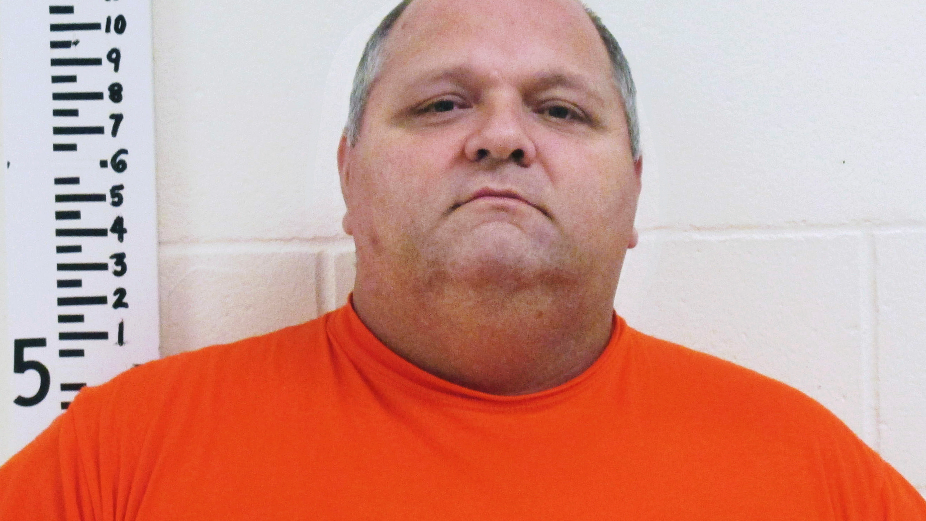 FILE - This undated booking photo released by the York County Sheriff's Department shows Michael Middleton, accused of marrying women in multiple states including New Hampshire. Middleton, who avoided jail time on bigamy charges could end up behind bars after all after authorities say he lied about his whereabouts and then disappeared. Middleton pleaded guilty last month and was given a 12-month suspended sentence. A warrant was issued for his arrest Wednesday, May 8, 2019, after a probation officer said Middleton was missing. (York County Sheriff's Department via AP, File)