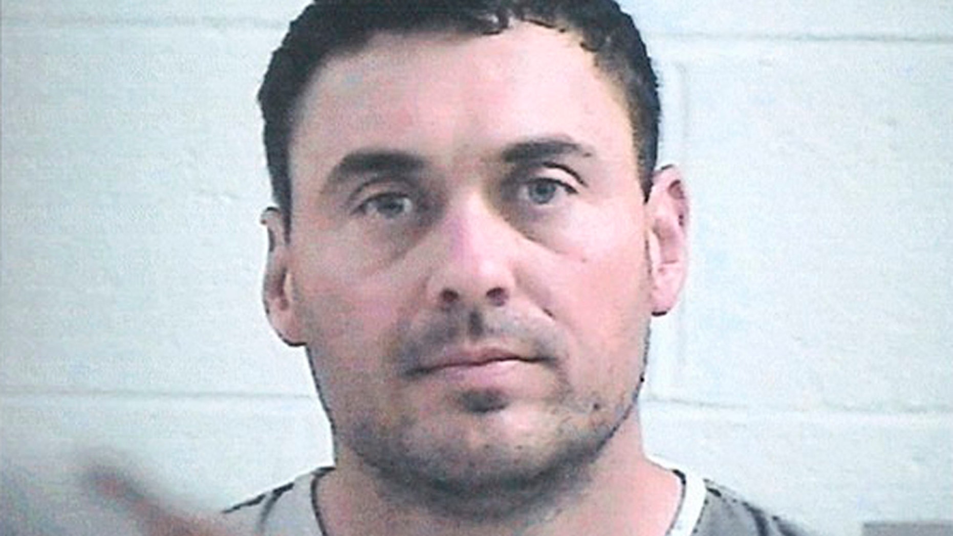 This undated photo provided by the Panola County Sheriff shows suspect Matthew Paul Kinne. The north Mississippi police officer is charged with murder in the death of a woman that he was romantically involved with. Oxford Police Officer Kinne has been charged with murder by the Mississippi Bureau of Investigation, according to a court order signed Tuesday, May 21, 2019, by Lafayette County Circuit Judge Andrew Howorth. Kinne was arrested Monday night after 32-year-old Dominque Clayton was found dead on Sunday. (Panola County Sheriff via AP)