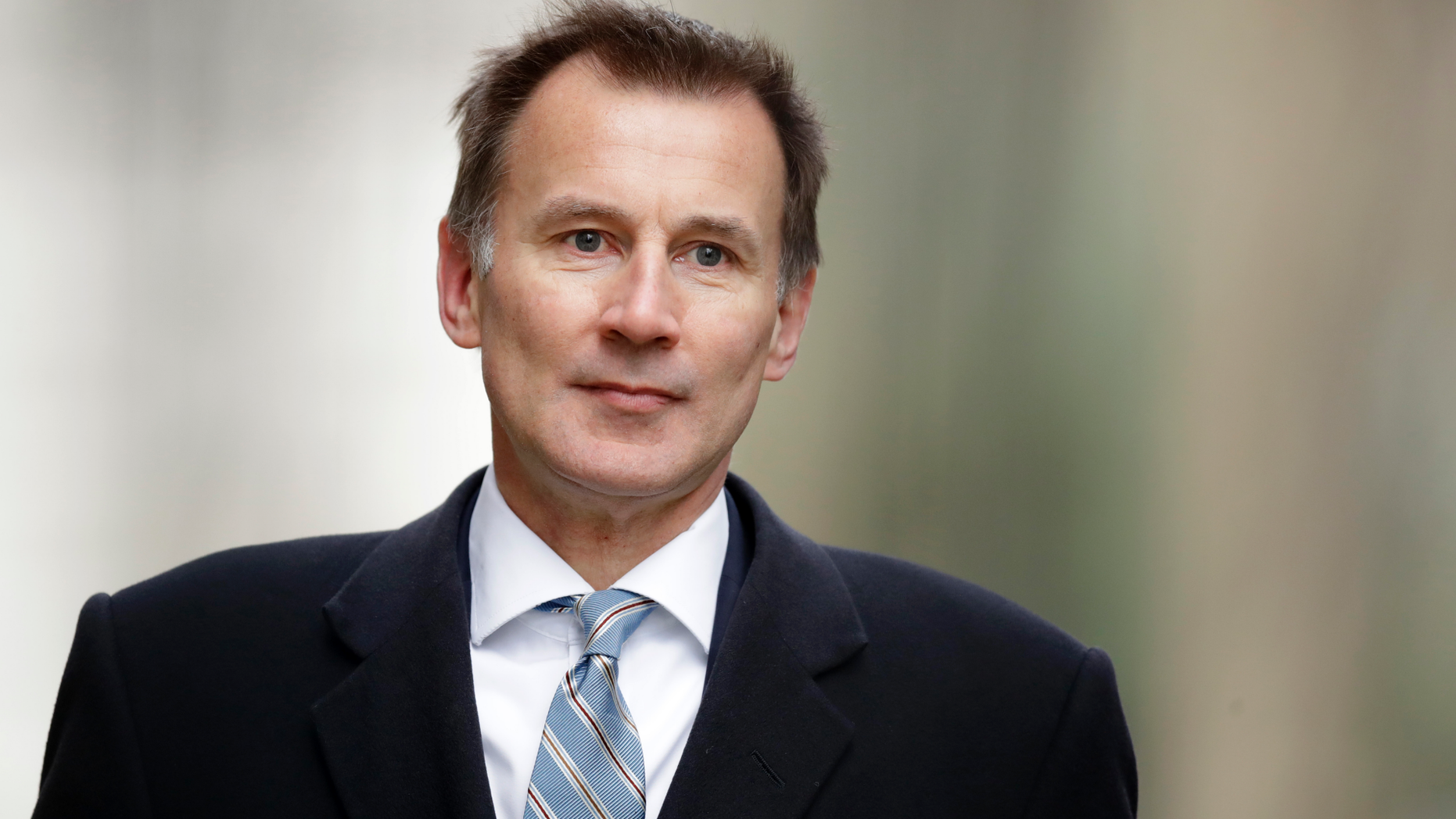 FILE - In this Wednesday, March 13, 2019 file photo, Britain's Foreign Secretary Jeremy Hunt arrives for a cabinet meeting at 10 Downing Street in London. Prime Minister Theresa May’s announcement that she will leave 10 Downing Street has set off a fierce competition to succeed her as Conservative Party leader _ and as the next prime minister. (AP Photo/Matt Dunham, File)